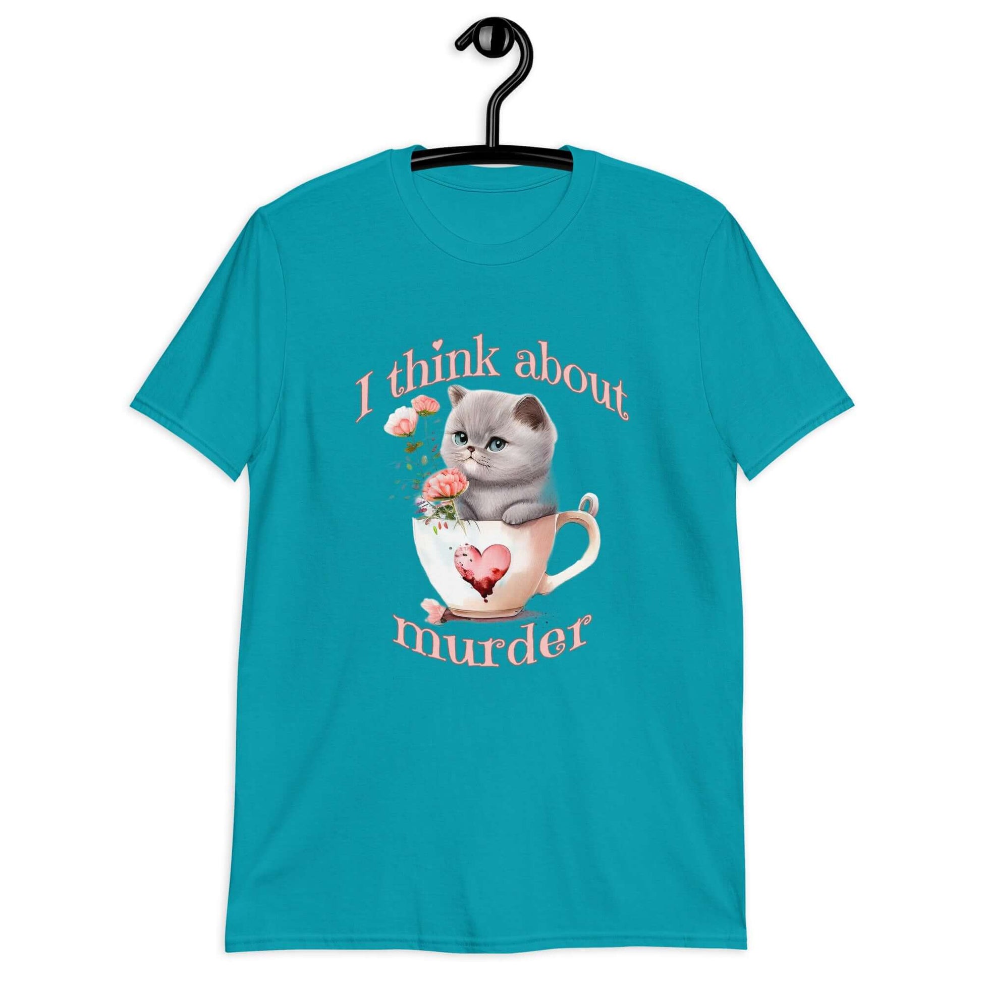 Tropical blue t-shirt that says I think about murder with image of cute fluffy kitten sitting in a teacup printed on the front.