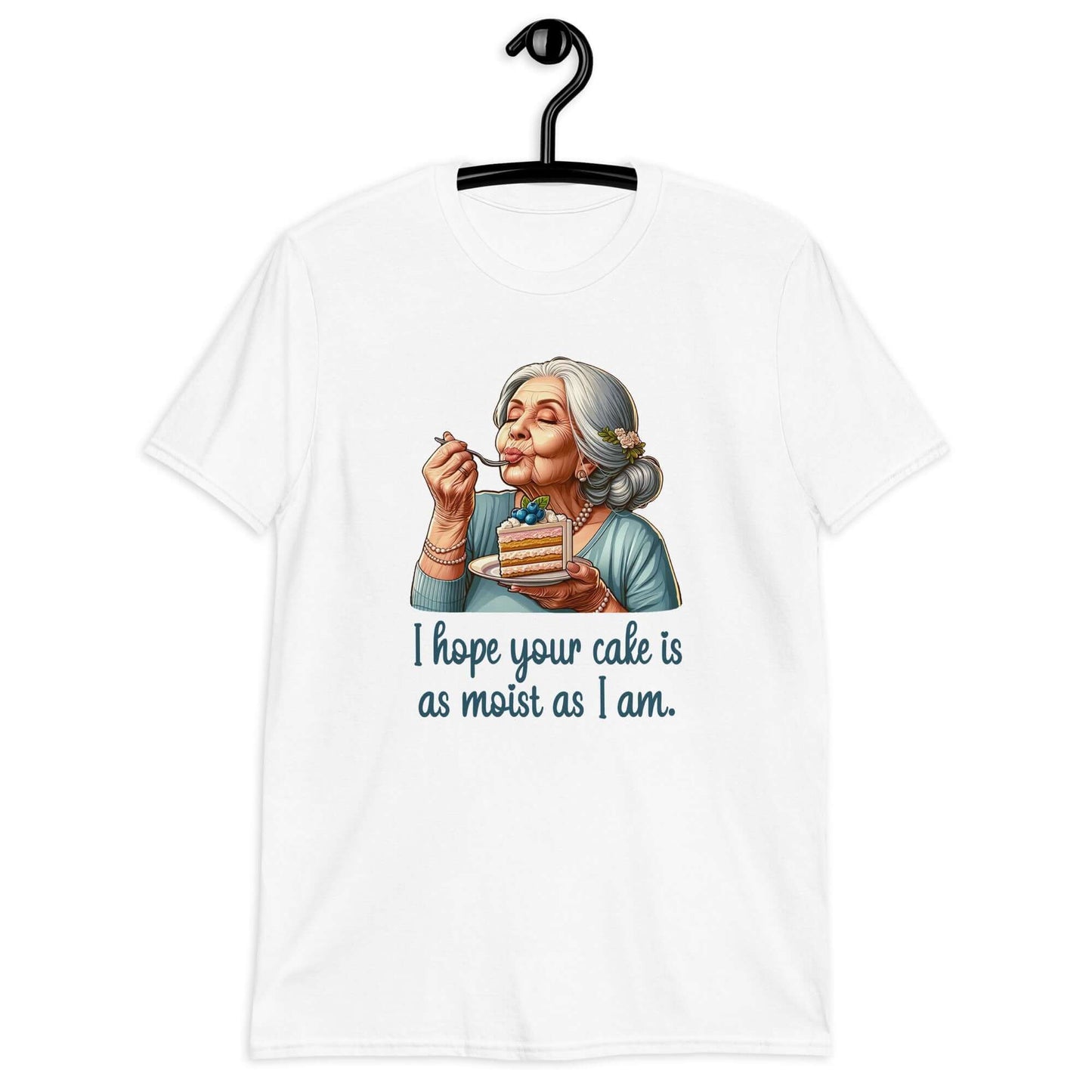 White t-shirt with image of grey haired older woman enjoying a bite of a piece of cake with the words I hope your cake is as moist as I am printed on the front.