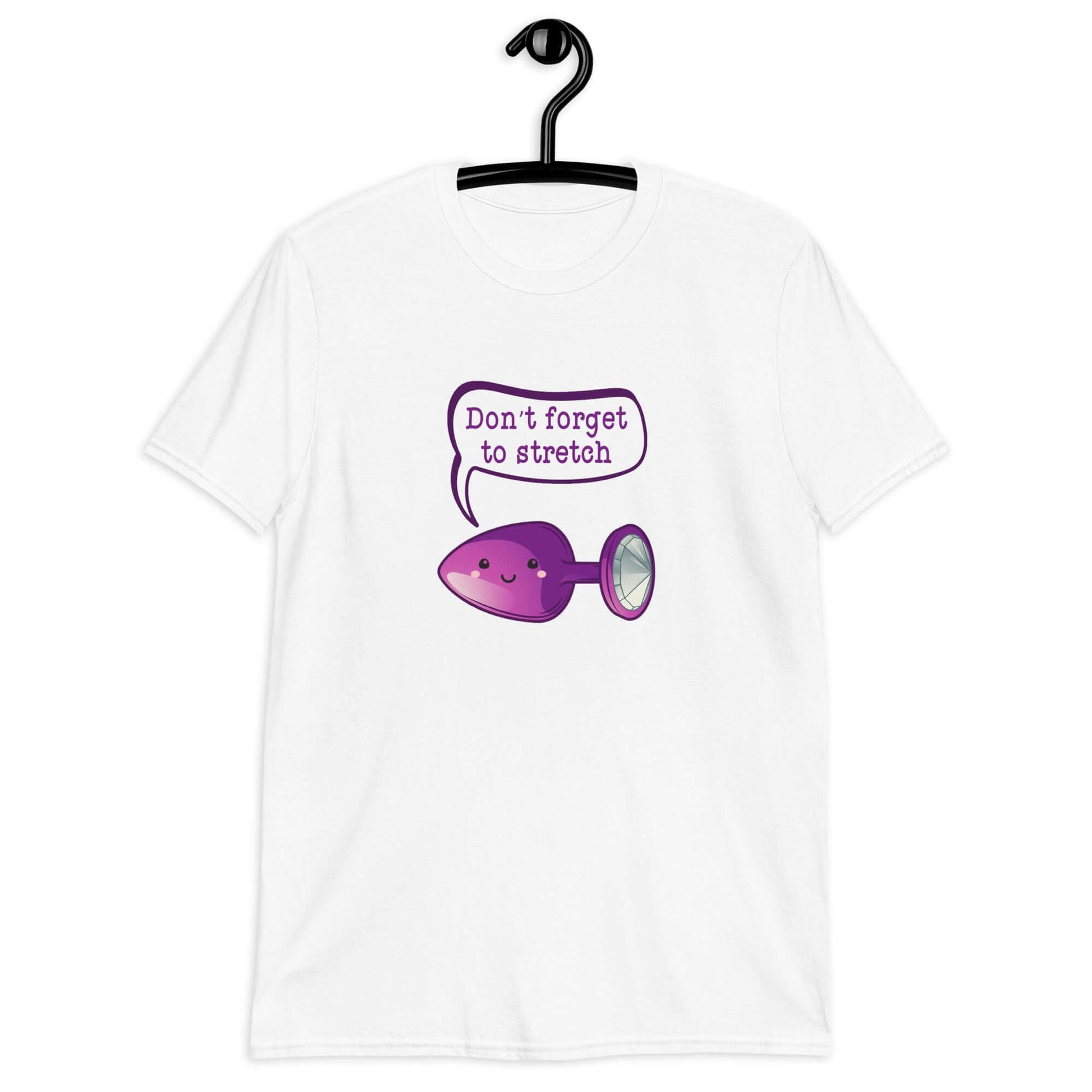 White t-shirt that has image of a purple anal plug with a smile face with a speech bubble above with the words Don't forget to stretch. The graphics are printed on the front of the shirt.