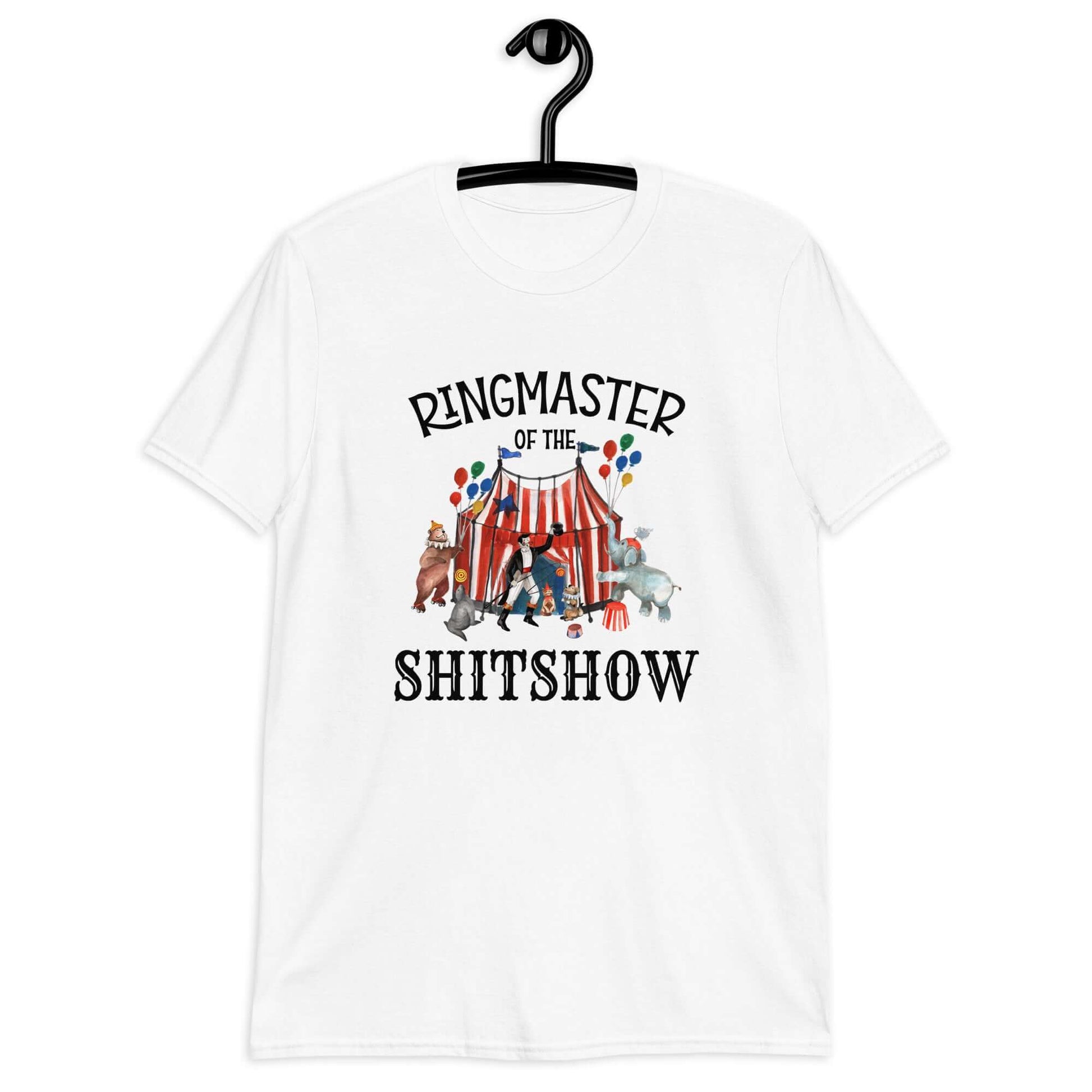 White t-shirt with a circus theme graphic and the words Ringmaster of the Shitshow printed on the front.