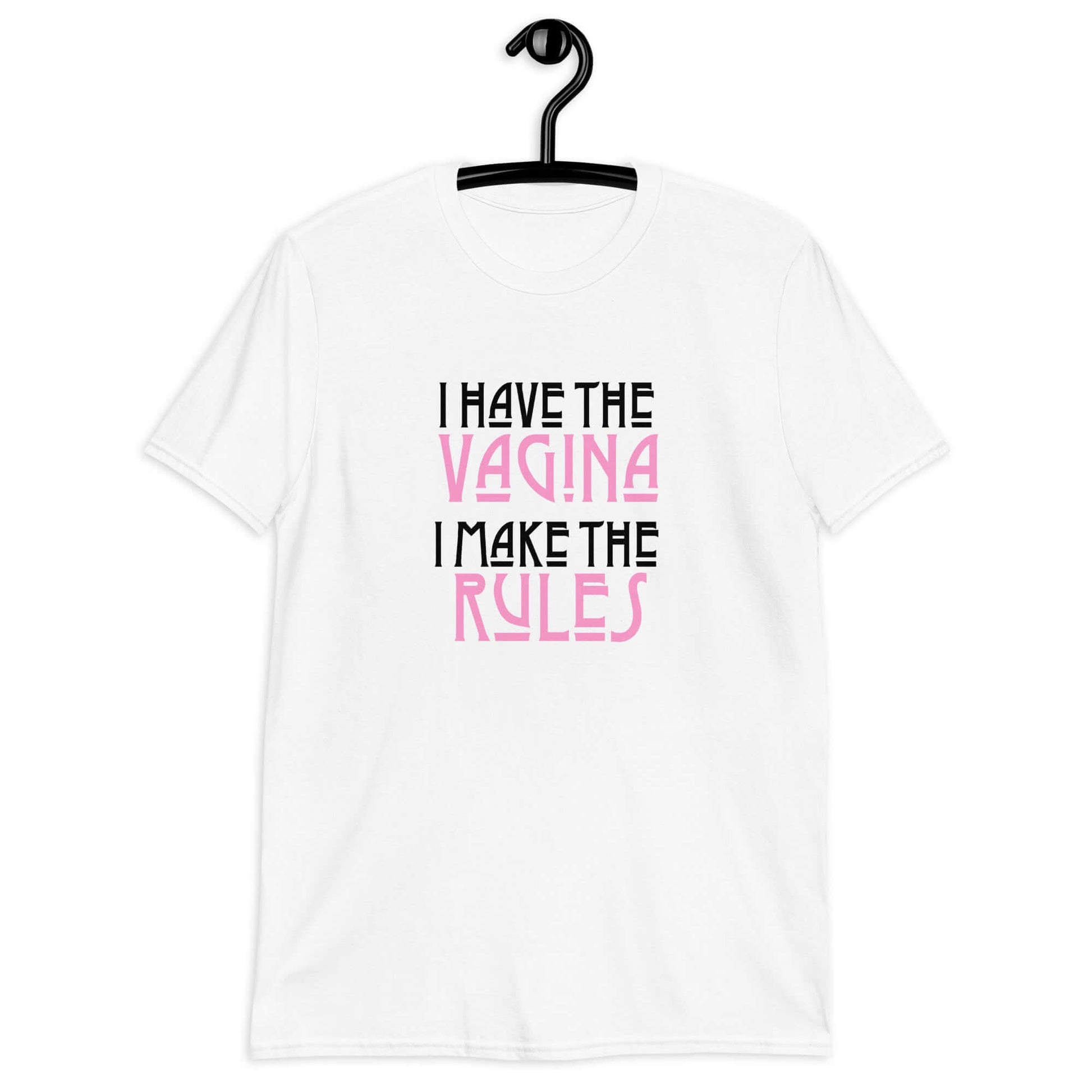 White t-shirt with the words I have the vagina , I make the rules printed on the front. The words vagina and rules are pink, the rest of the words are black.