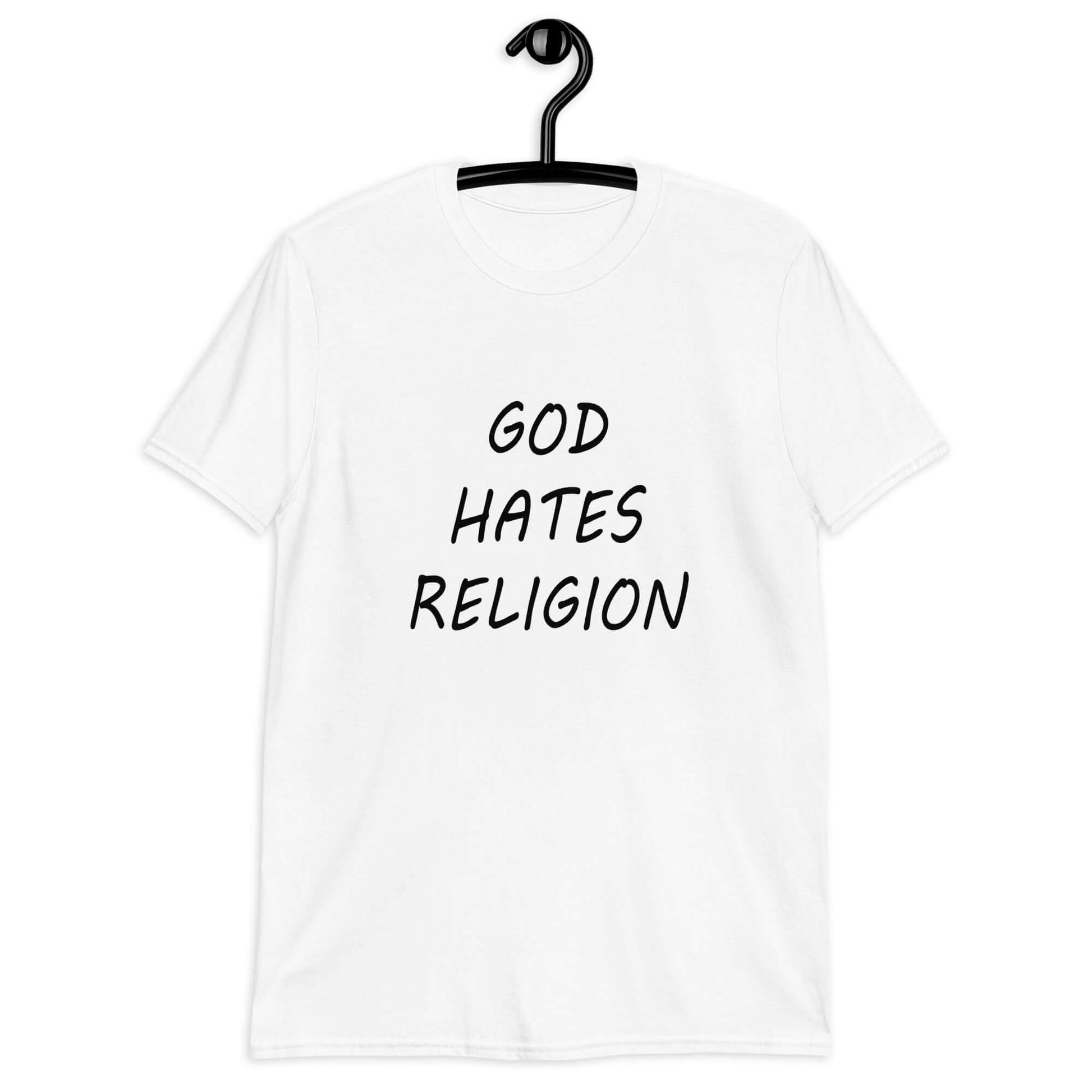 White t-shirt with the phrase God hates religion printed on the front.