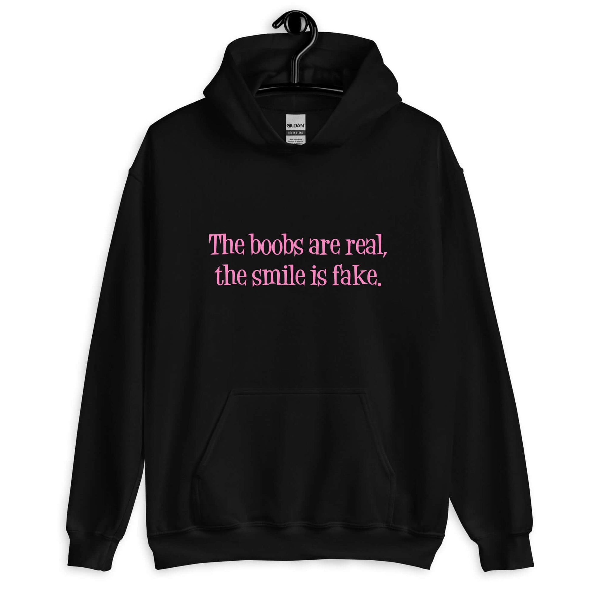 Black hoodie sweatshirt with the phrase The boobs are real, the smile is fake printed in pink on the front.