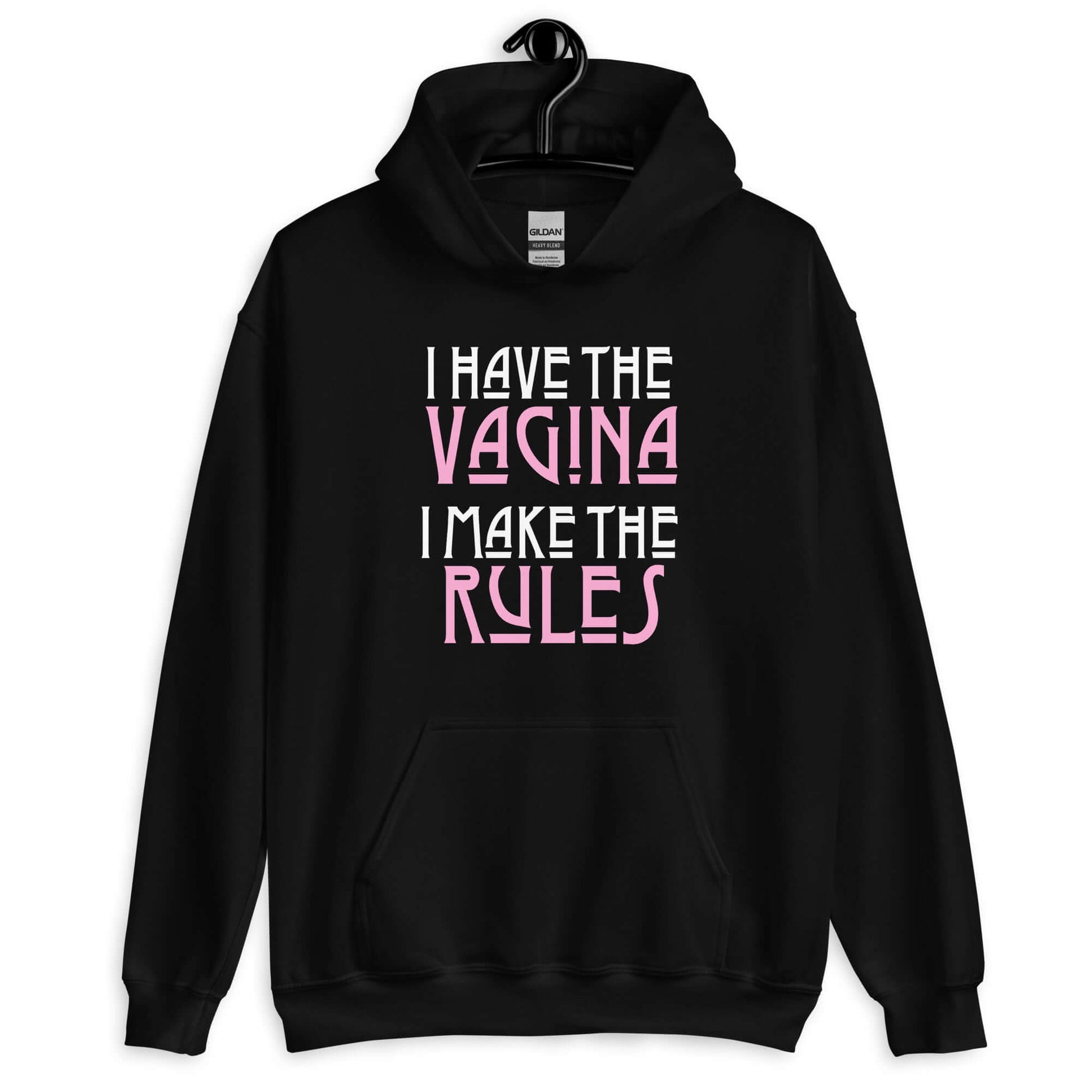 Black hoodie sweatshirt with the words I have the vagina , I make the rules printed on the front. The words vagina and rules are pink, the rest of the words are white.