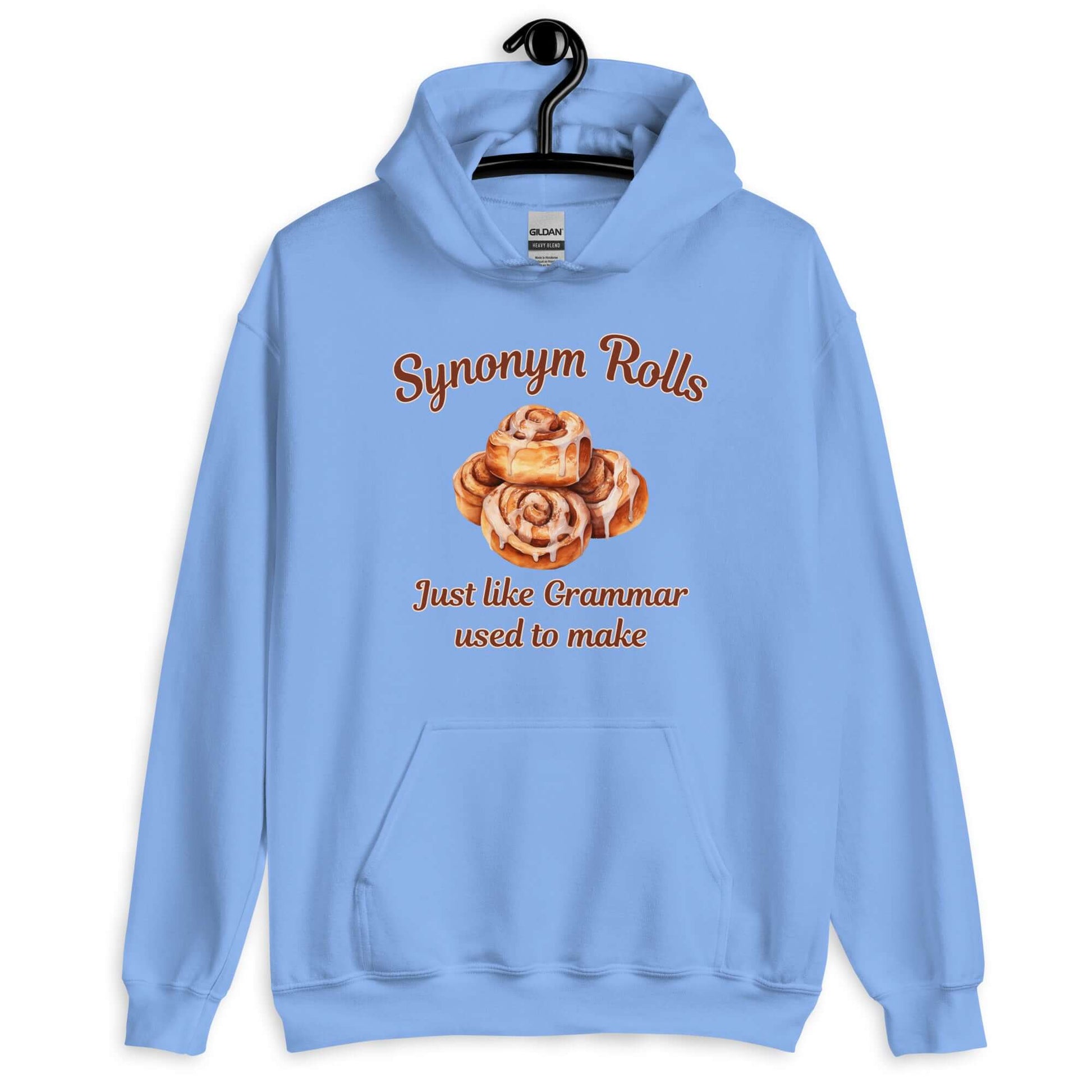 Carolina blue hoodie sweatshirt with an image of cinnamon rolls and the pun phrase Synonym rolls Just like Grammar used to make printed on the front.