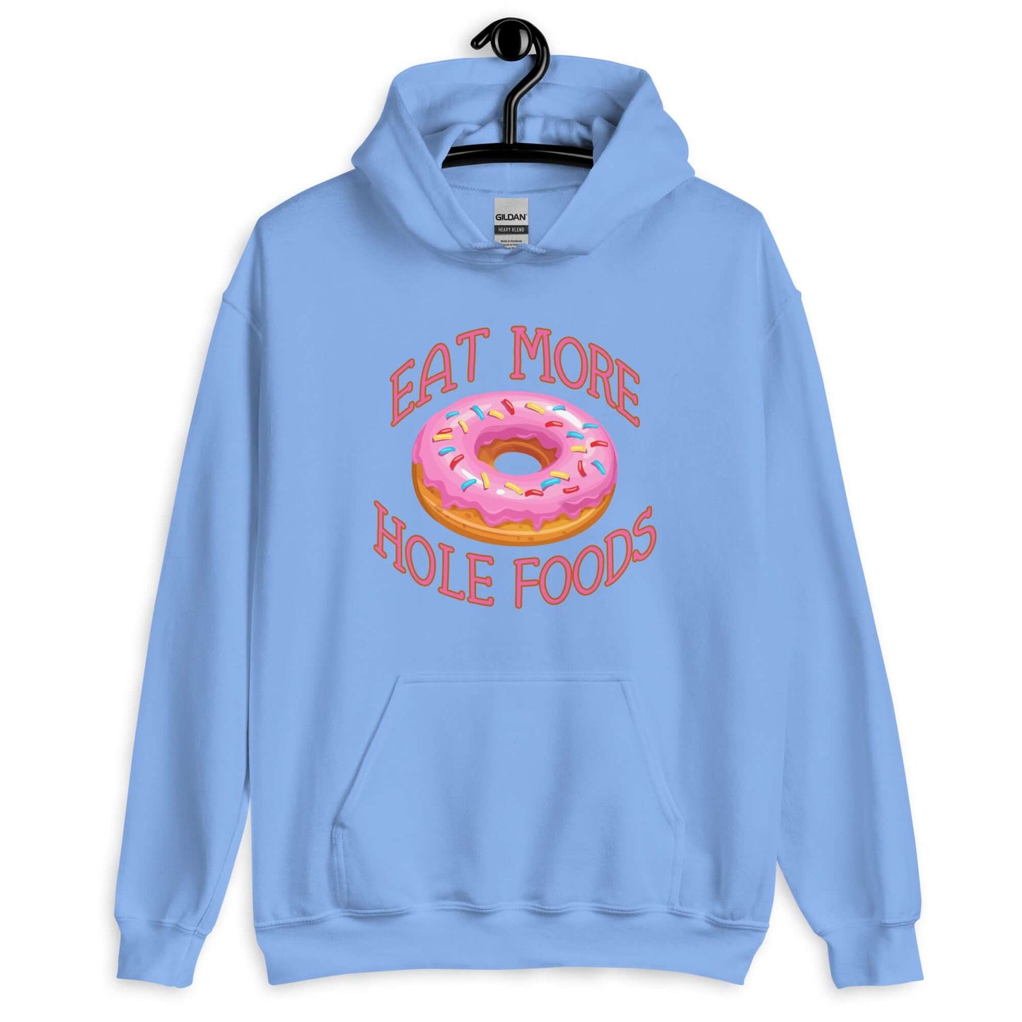 Carolina blue hoodie sweatshirt with an image of a donut with pink icing and sprinkles and the words Eat more hole foods printed on the front.