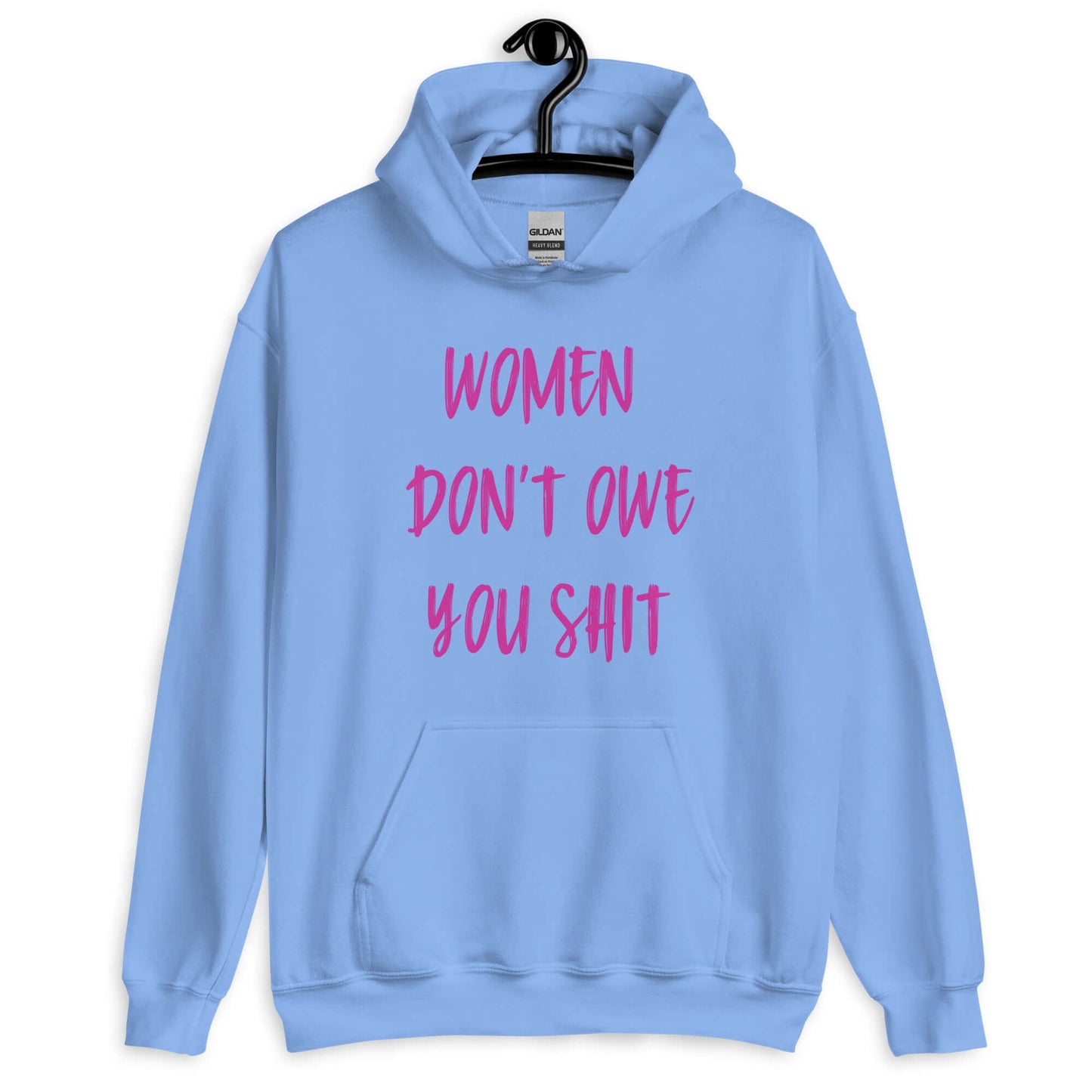 Carolina blue hoodie sweatshirt with the words Women don't owe you shit printed on the front in pink.