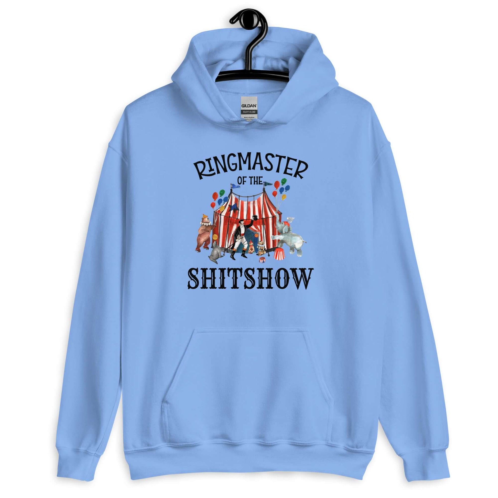 Carolina blue hoodie sweatshirt with a circus theme graphic and the words Ringmaster of the Shitshow printed on the front.