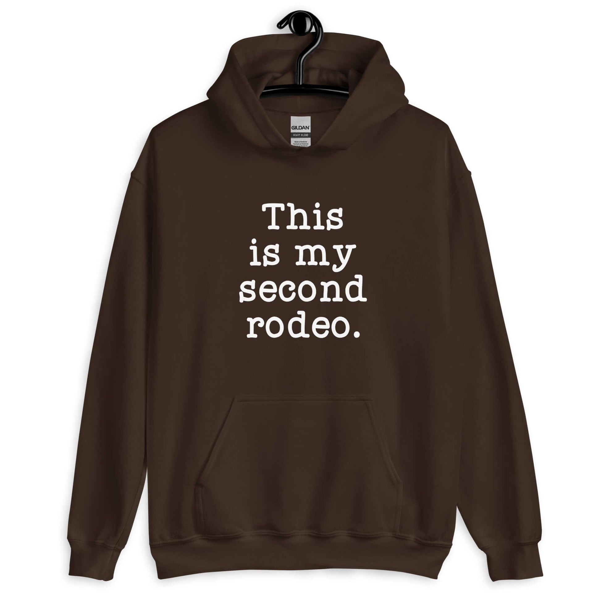 Dark chocolate brown hoodie sweatshirt with the funny phrase This is my second rodeo printed on the front.