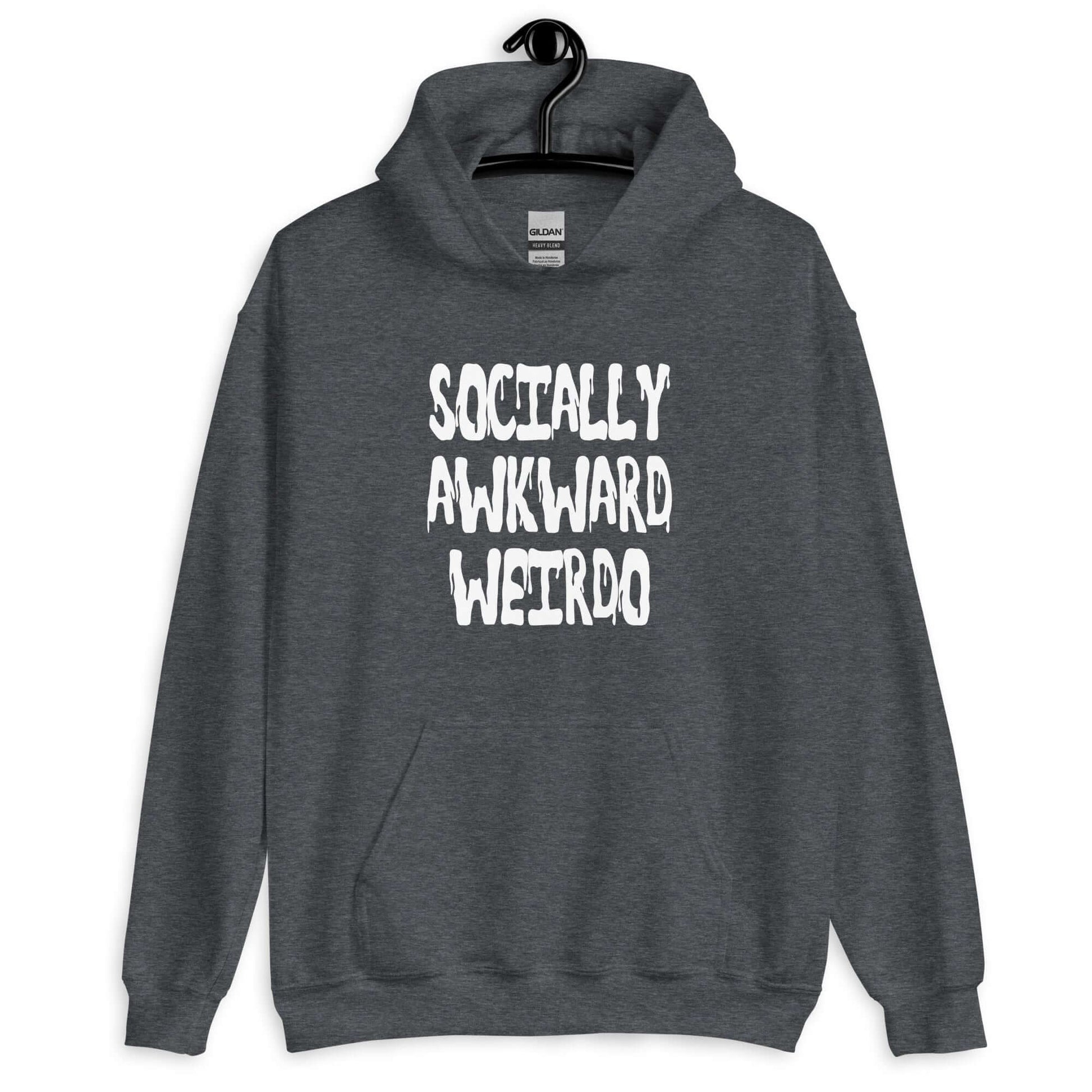 Dark heather hoodie sweatshirt with the phrase Socially awkward weirdo printed on the front.