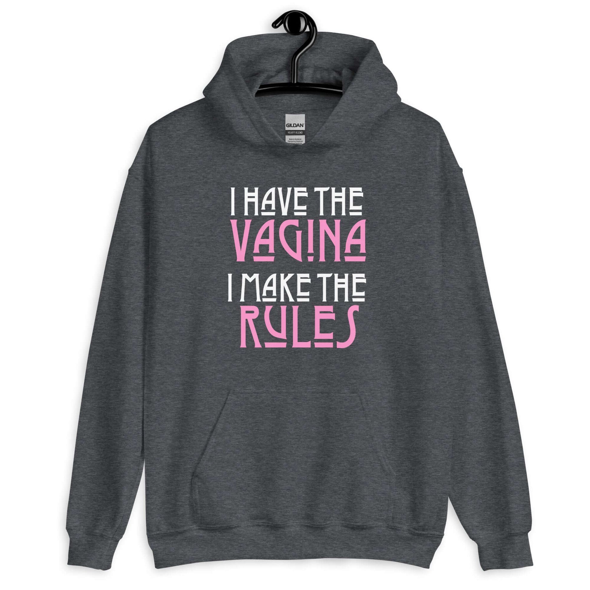 Dark heather hoodie sweatshirt with the words I have the vagina , I make the rules printed on the front. The words vagina and rules are pink, the rest of the words are white.