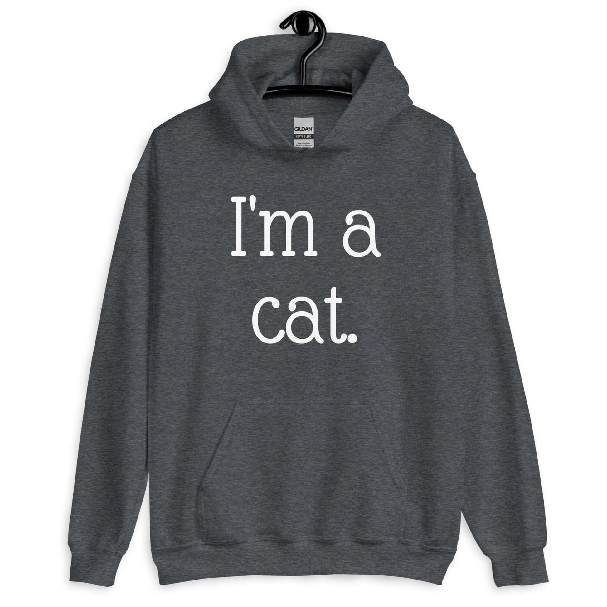 Dark heather grey hoodie sweatshirt with the words I'm a cat printed on the front.