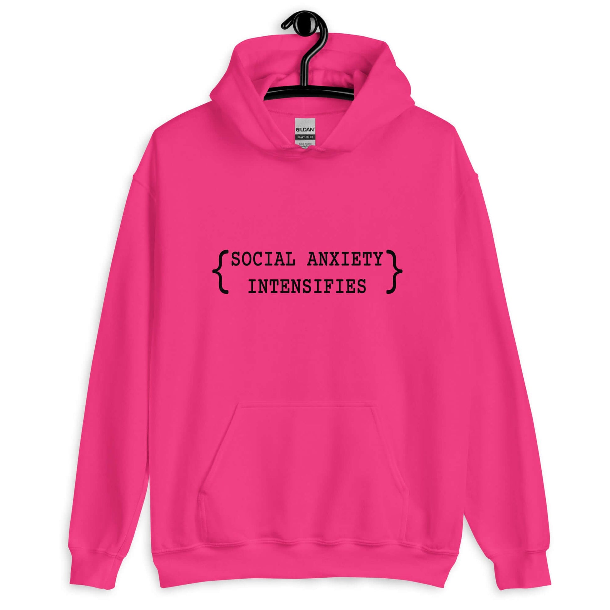 Heliconia pink hoodie sweatshirt with the words Social anxiety intensifies printed on the front.