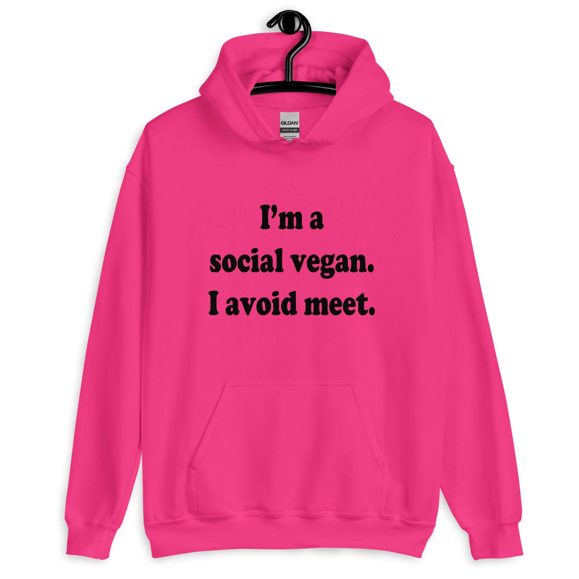 Heliconia pink hoodie sweatshirt with the pun phrase I'm a social vegan, I avoid meet printed on the front.