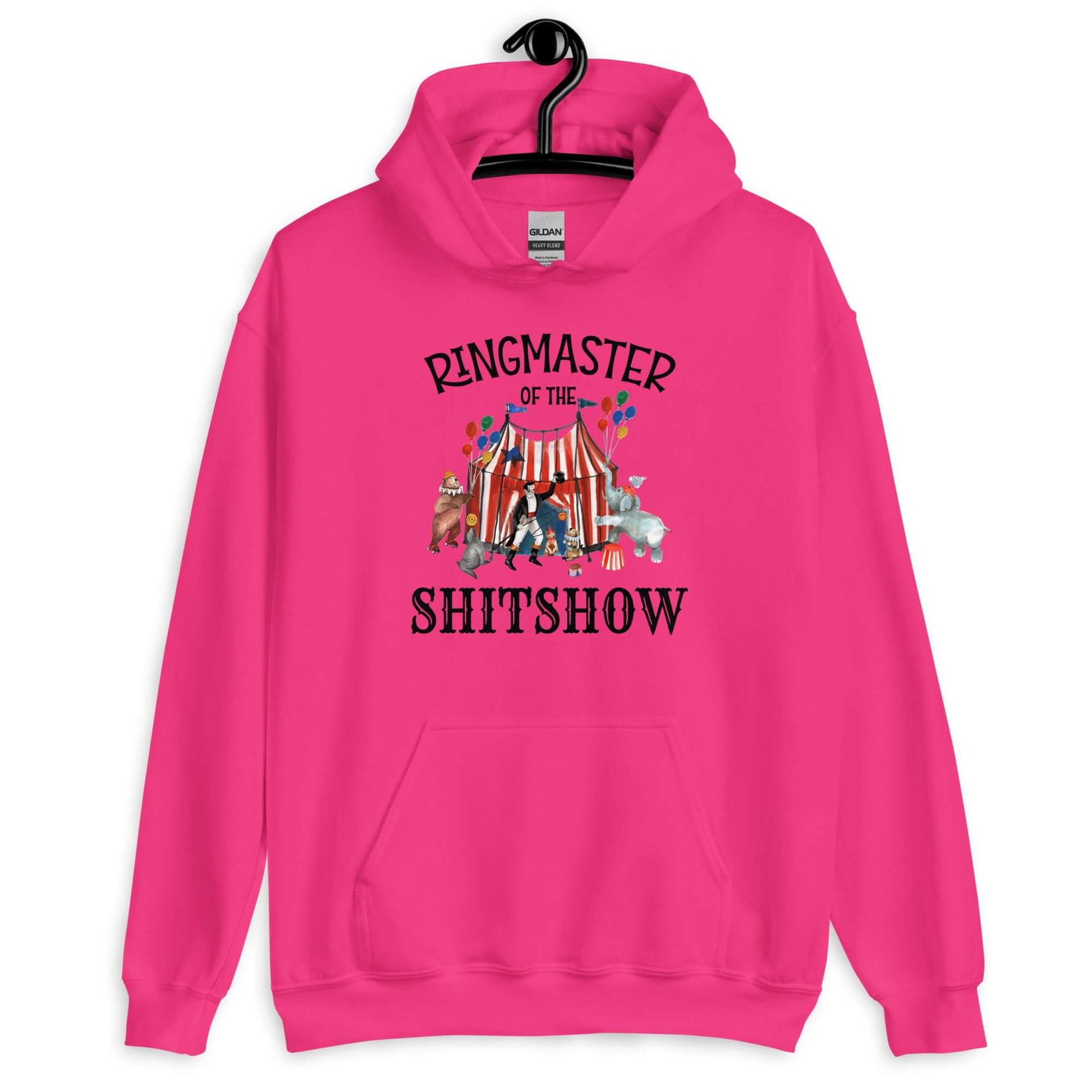 Heliconia pink hoodie sweatshirt with a circus theme graphic and the words Ringmaster of the Shitshow printed on the front.