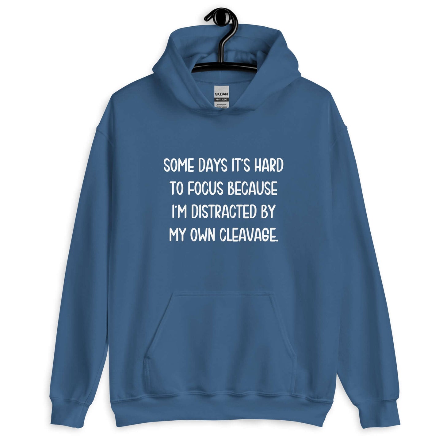 Indigo blue hoodie sweatshirt with the phrase Some days it's hard to focus because I'm distracted by my own cleavage printed on the front.