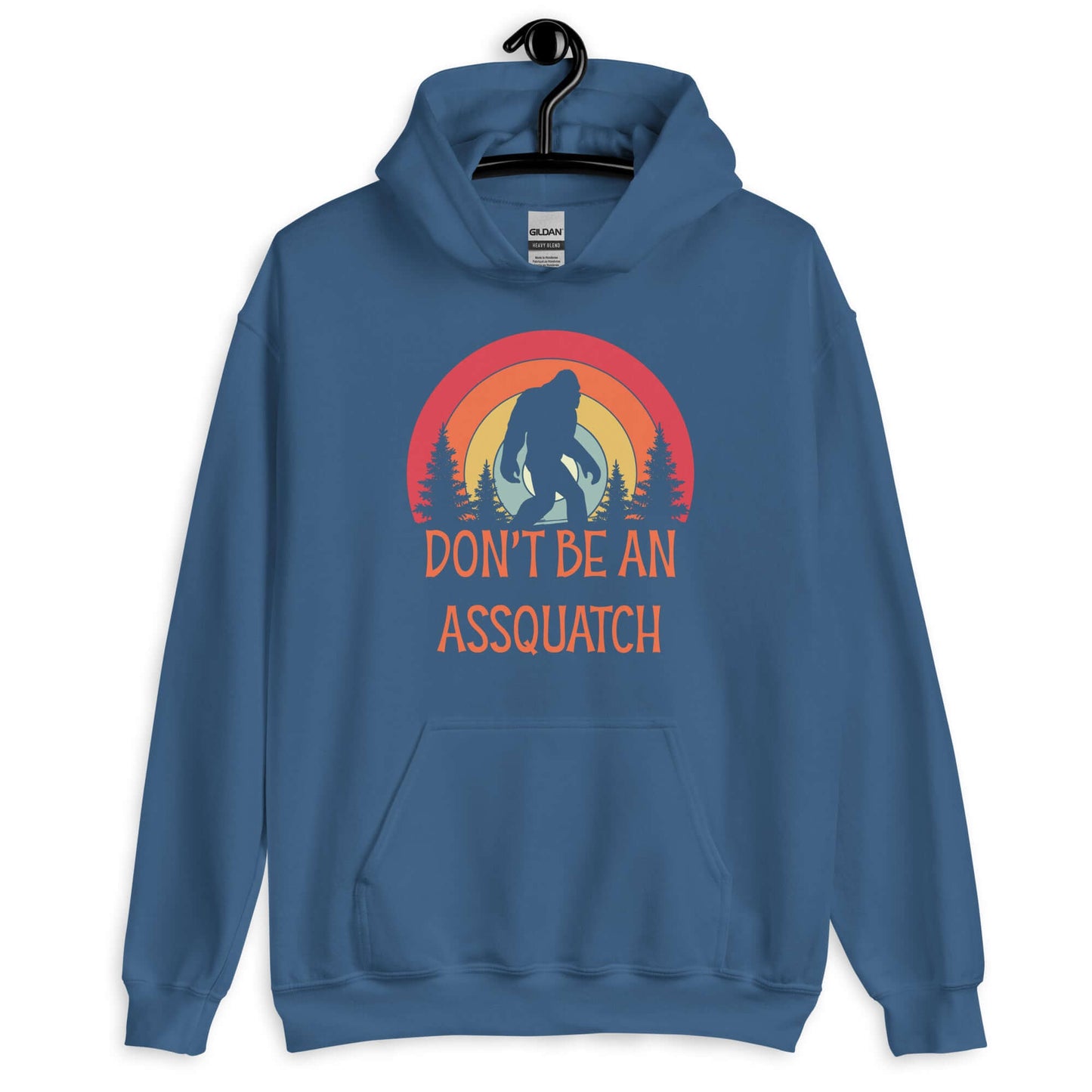 Indigo blue hoodie sweatshirt with sasquatch graphic and the words don't be an assquatch printed on the front.