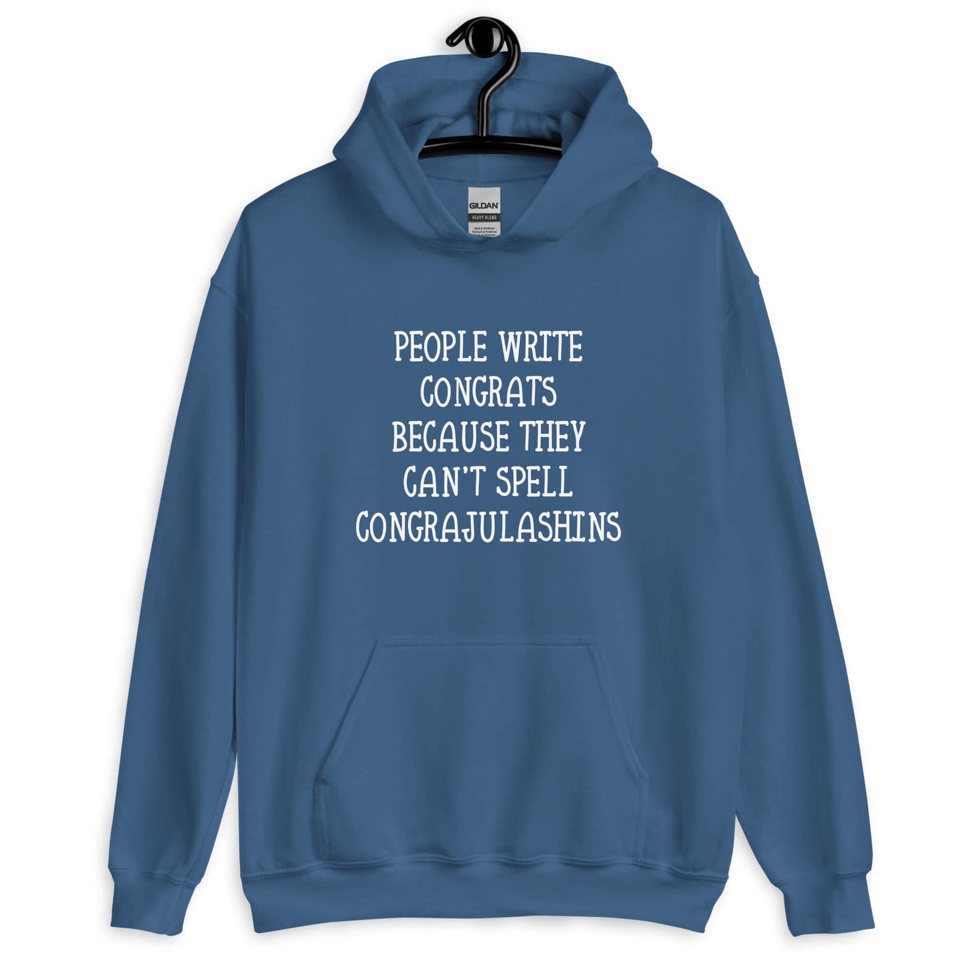 Indigo blue hoodie sweatshirt with the words People write congrats because they can't spell congratulations printed on the front. The word congratulations is intentionally misspelled.