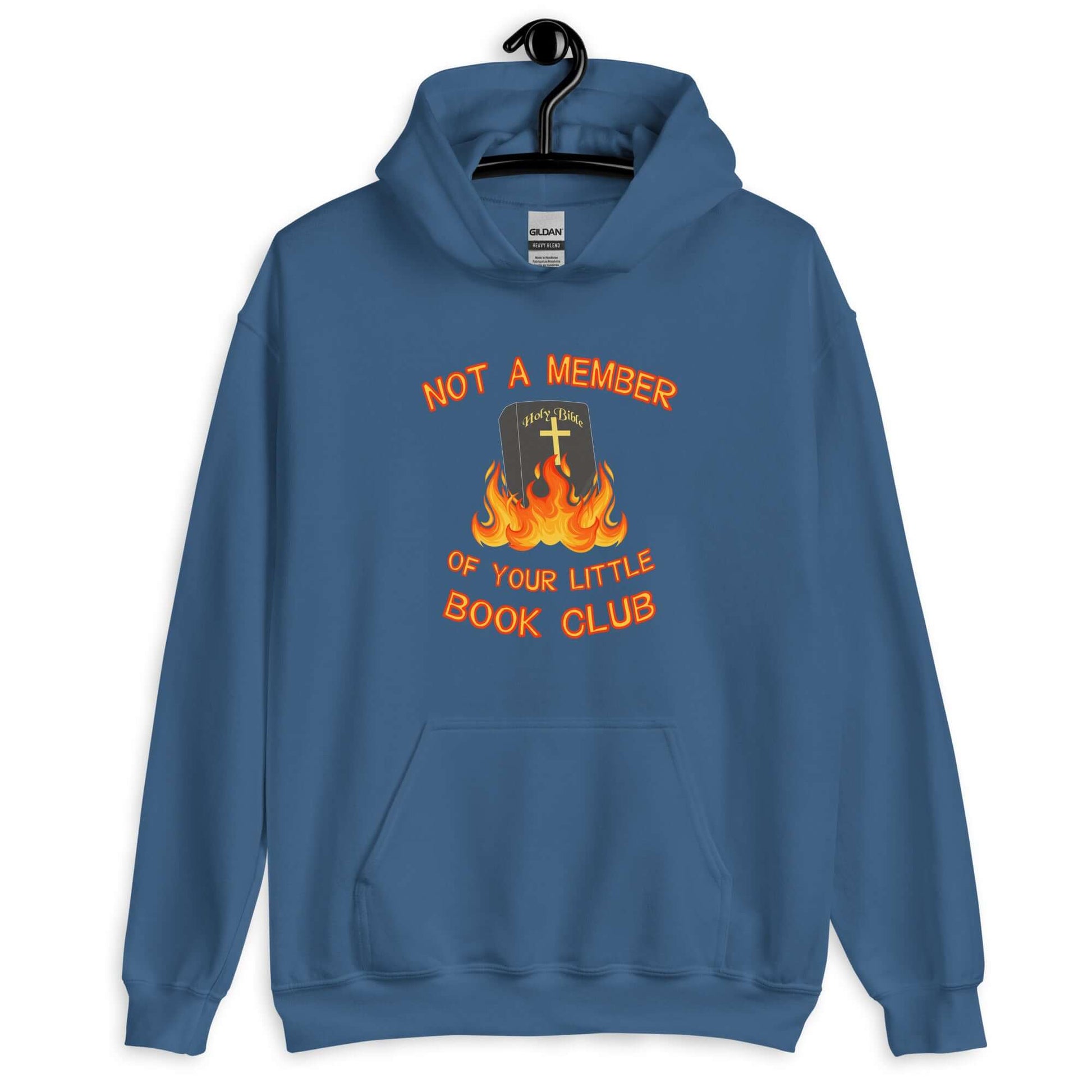 Indigo blue hoodie sweatshirt with image of a burning bible and the words Not a member of your little book club printed on the front.