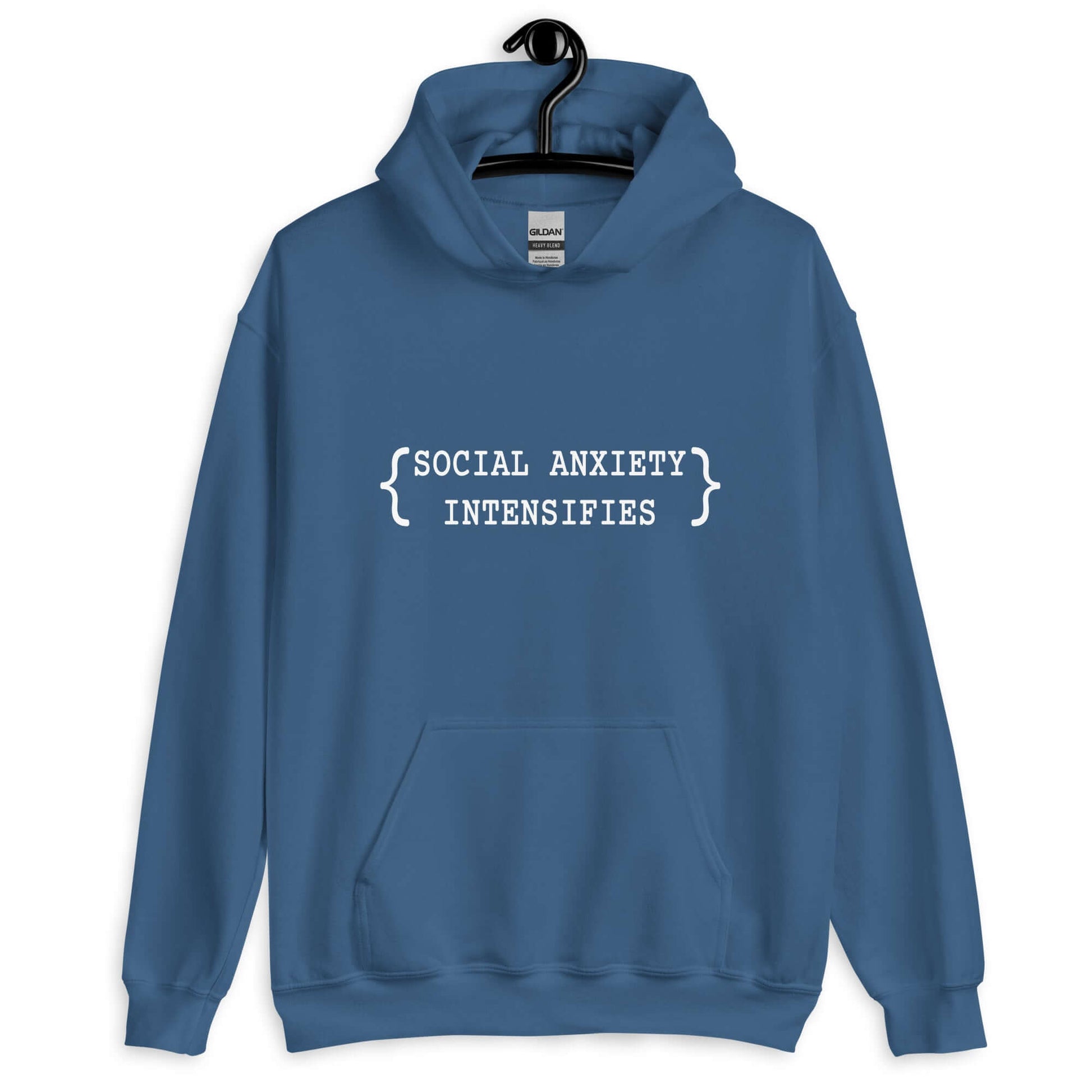 Indigo blue hoodie sweatshirt with the words Social anxiety intensifies printed on the front.