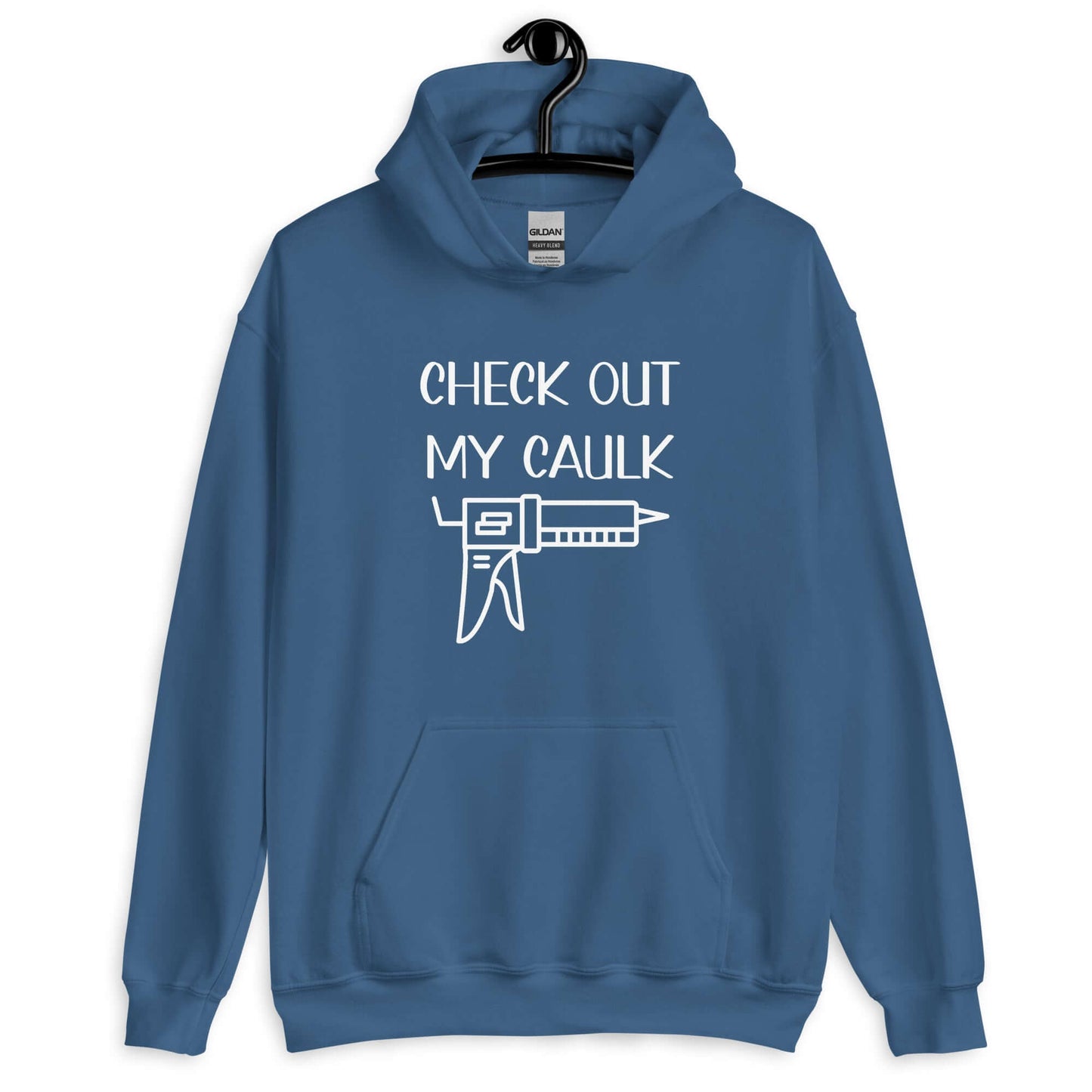 Indigo blue hoodie sweatshirt with the pun phrase Check out my caulk with a line drawing image of a caulking gun printed on the front.