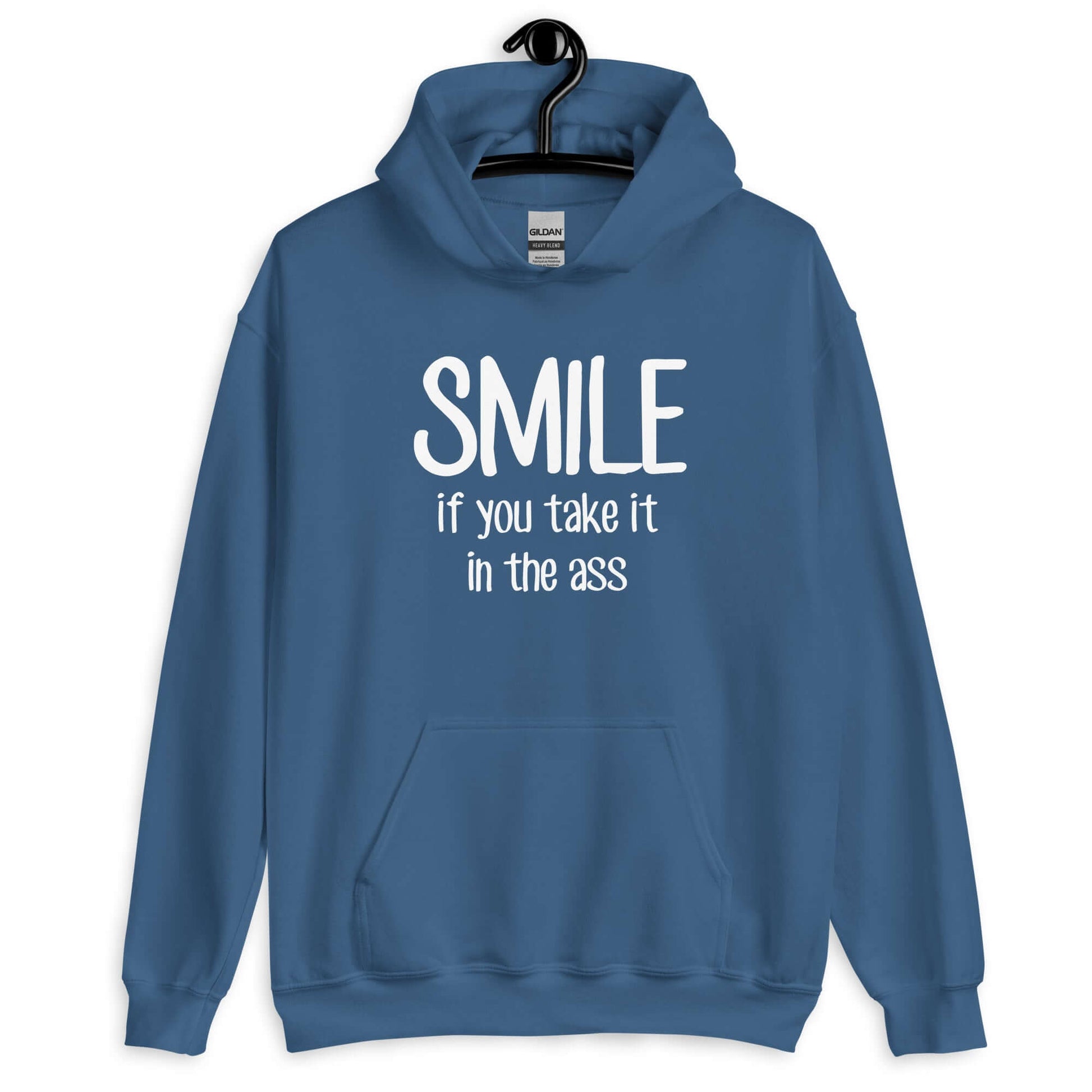 Indigo blue hoodie sweatshirt with the phrase Smile if you take it in the ass printed on the front. The word smile is large and the words take it in the ass are much smaller.