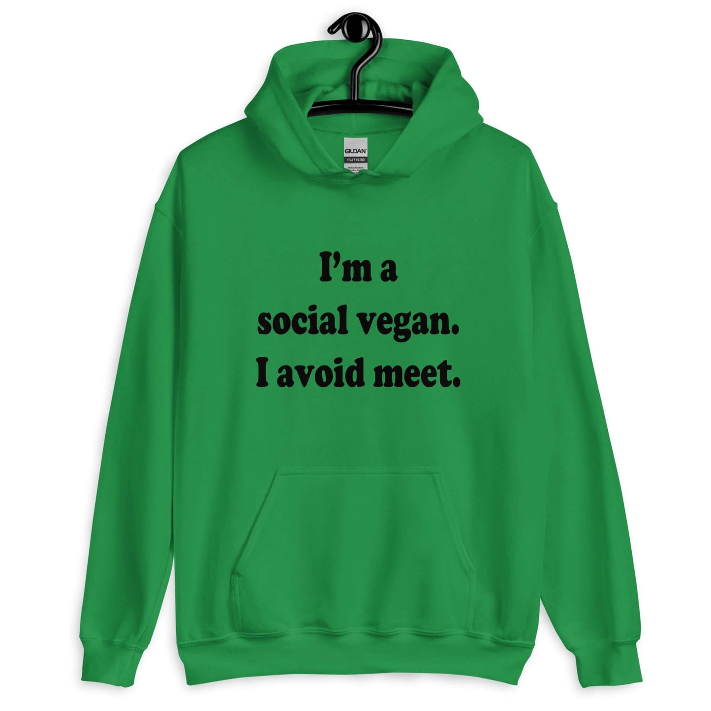 Irish green hoodie sweatshirt with the pun phrase I'm a social vegan, I avoid meet printed on the front.