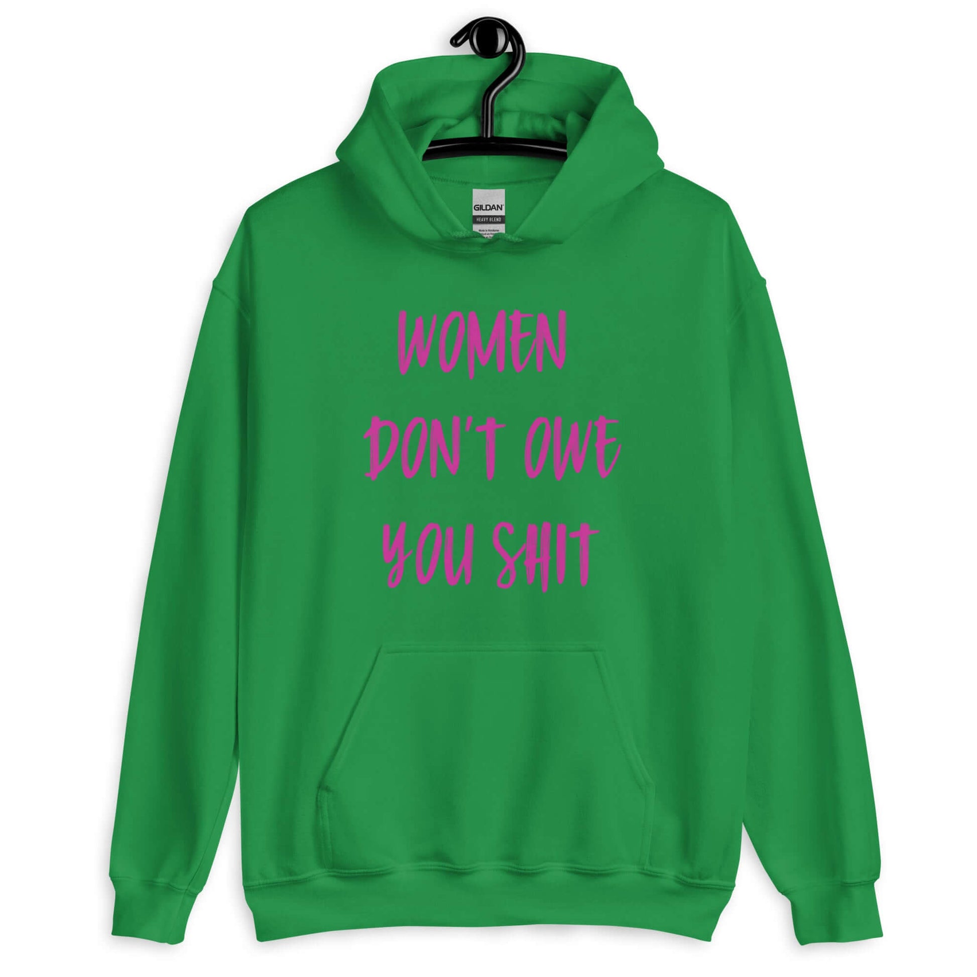 Irish green hoodie sweatshirt with the words Women don't owe you shit printed on the front in pink.