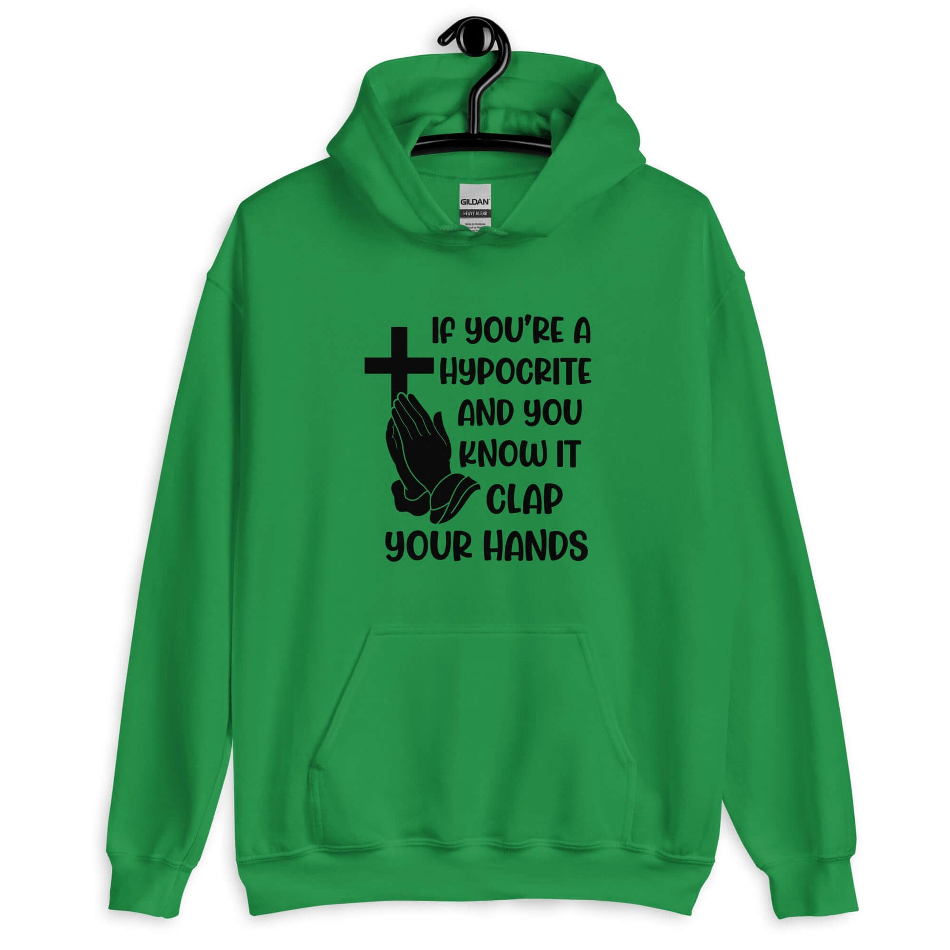 Irish green hoodie sweatshirt with image of a cross and praying hands & the phrase If you're a hypocrite and you know it clap your hands printed on the front.