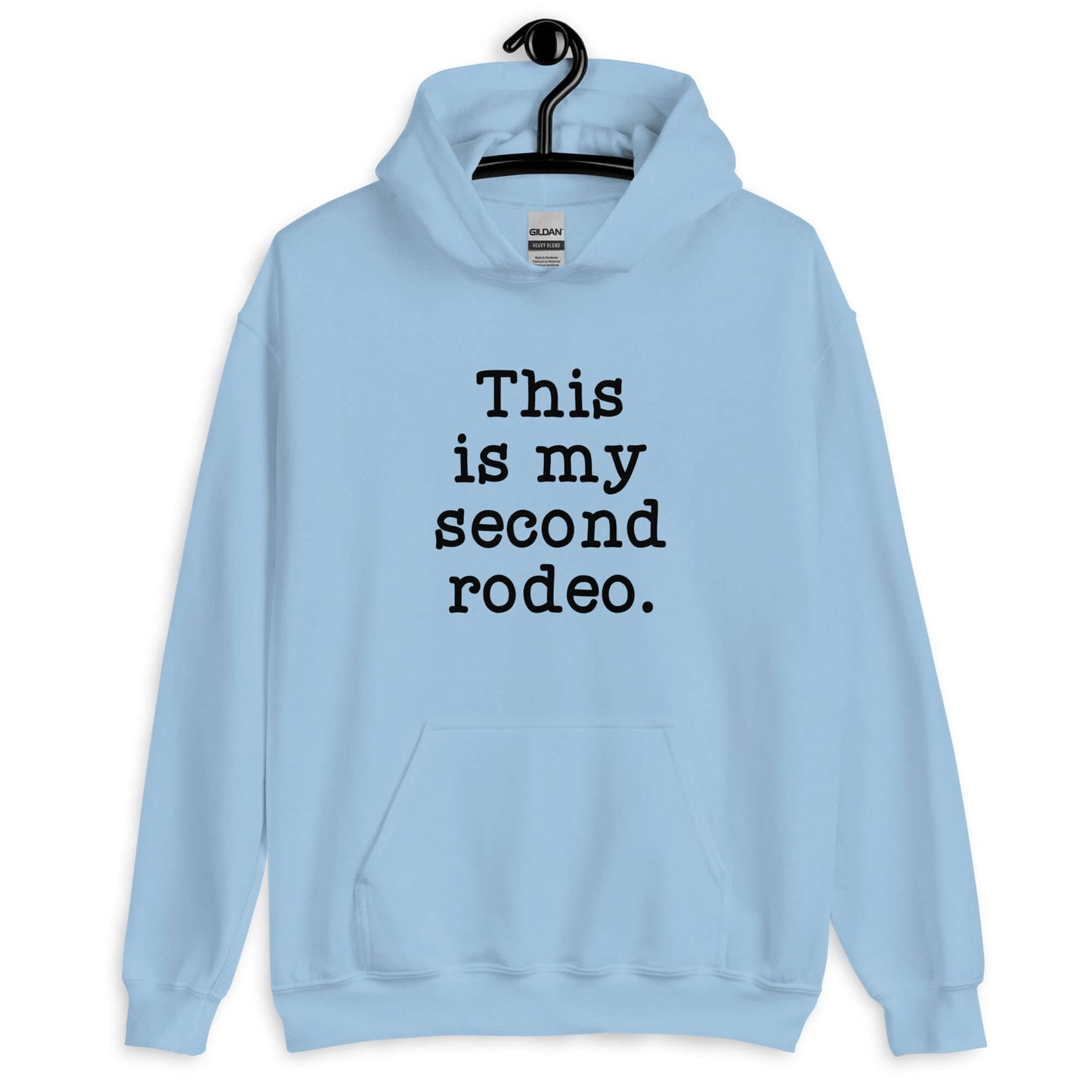 Light blue hoodie sweatshirt with the funny phrase This is my second rodeo printed on the front.