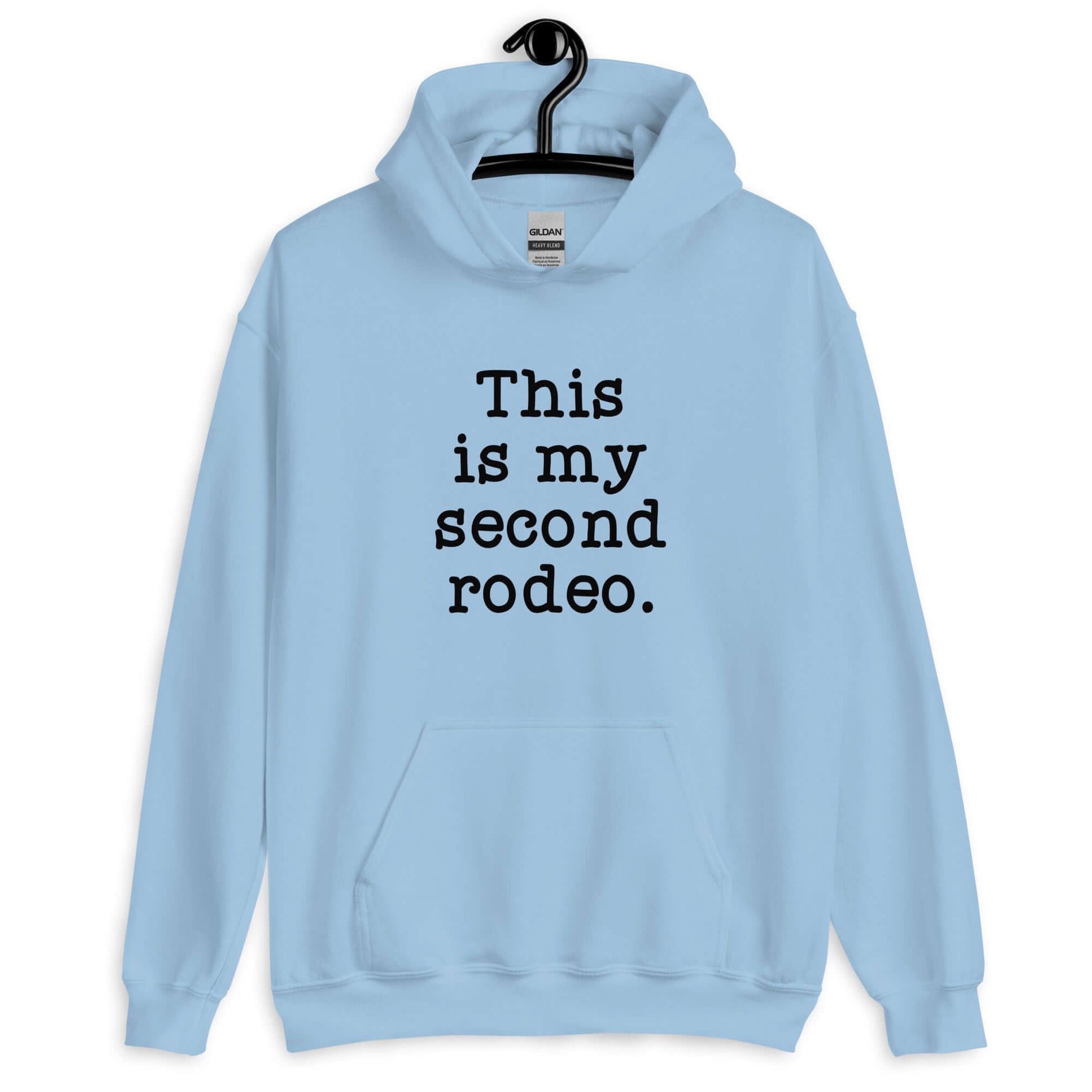 Light blue hoodie sweatshirt with the funny phrase This is my second rodeo printed on the front.