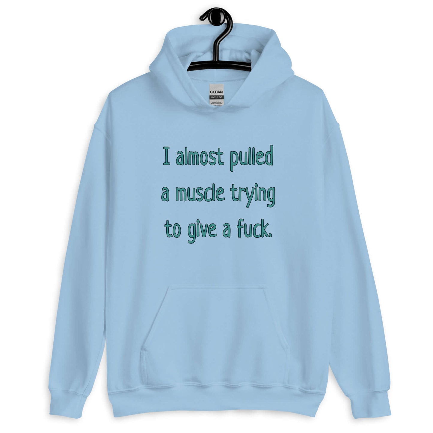 Light blue hoodie sweatshirt with the words I Almost pulled a muscle trying to give a fuck printed on the front.