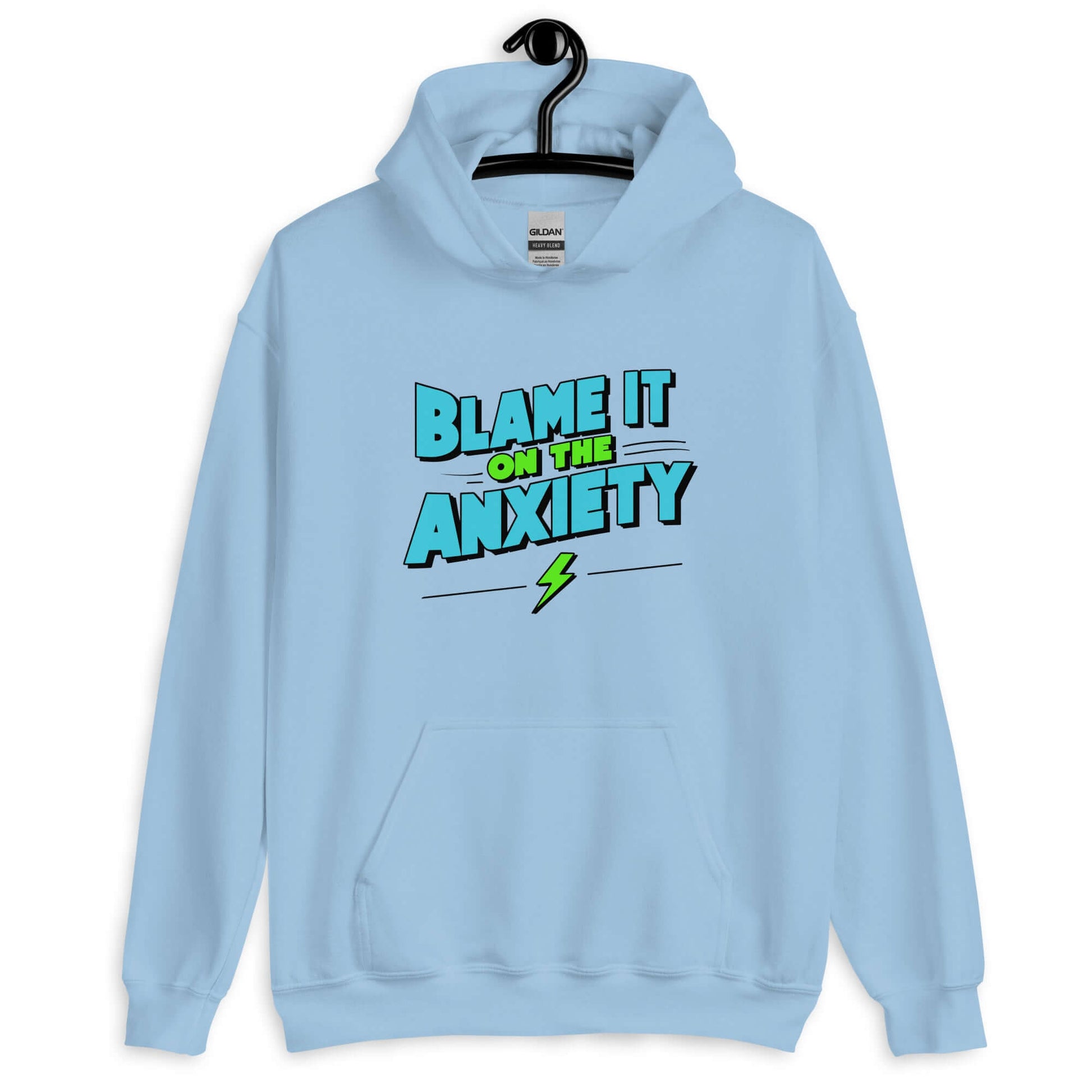 Light blue hoodie sweatshirt with the phrase Blame is on the anxiety printed on the front. The graphics are bold and in aqua and lime green.