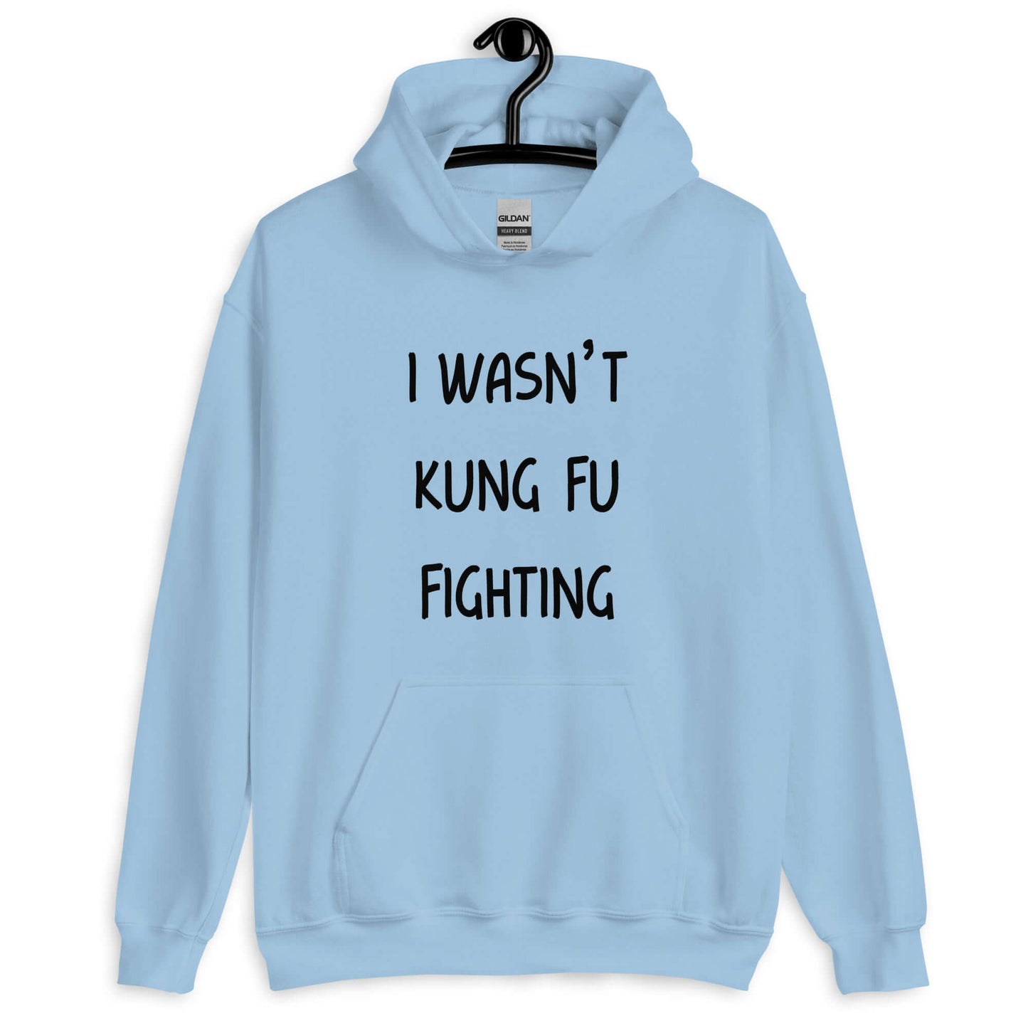 Light blue hoodie sweatshirt with the funny phrase I wasn't kung fu fighting printed on the front.