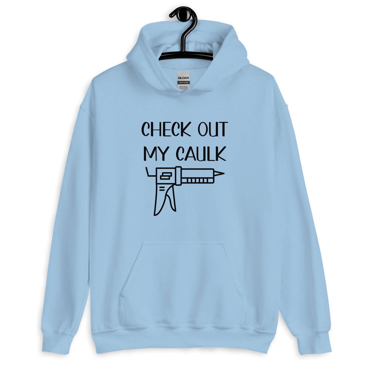 Light blue hoodie sweatshirt with the pun phrase Check out my caulk with a line drawing image of a caulking gun printed on the front.