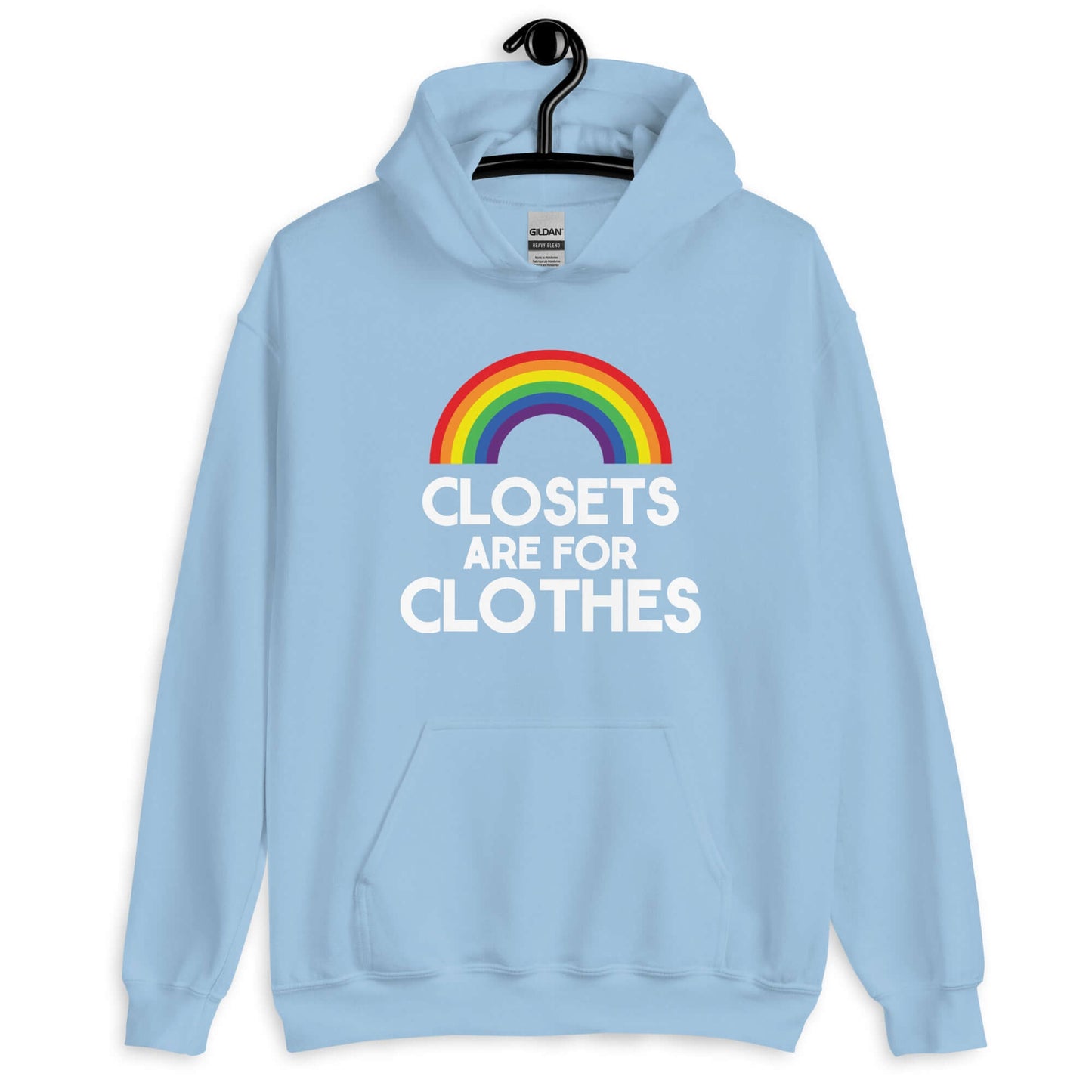 Light blue hoodie sweatshirt with a rainbow and the words Clothes are for closets printed on the front.