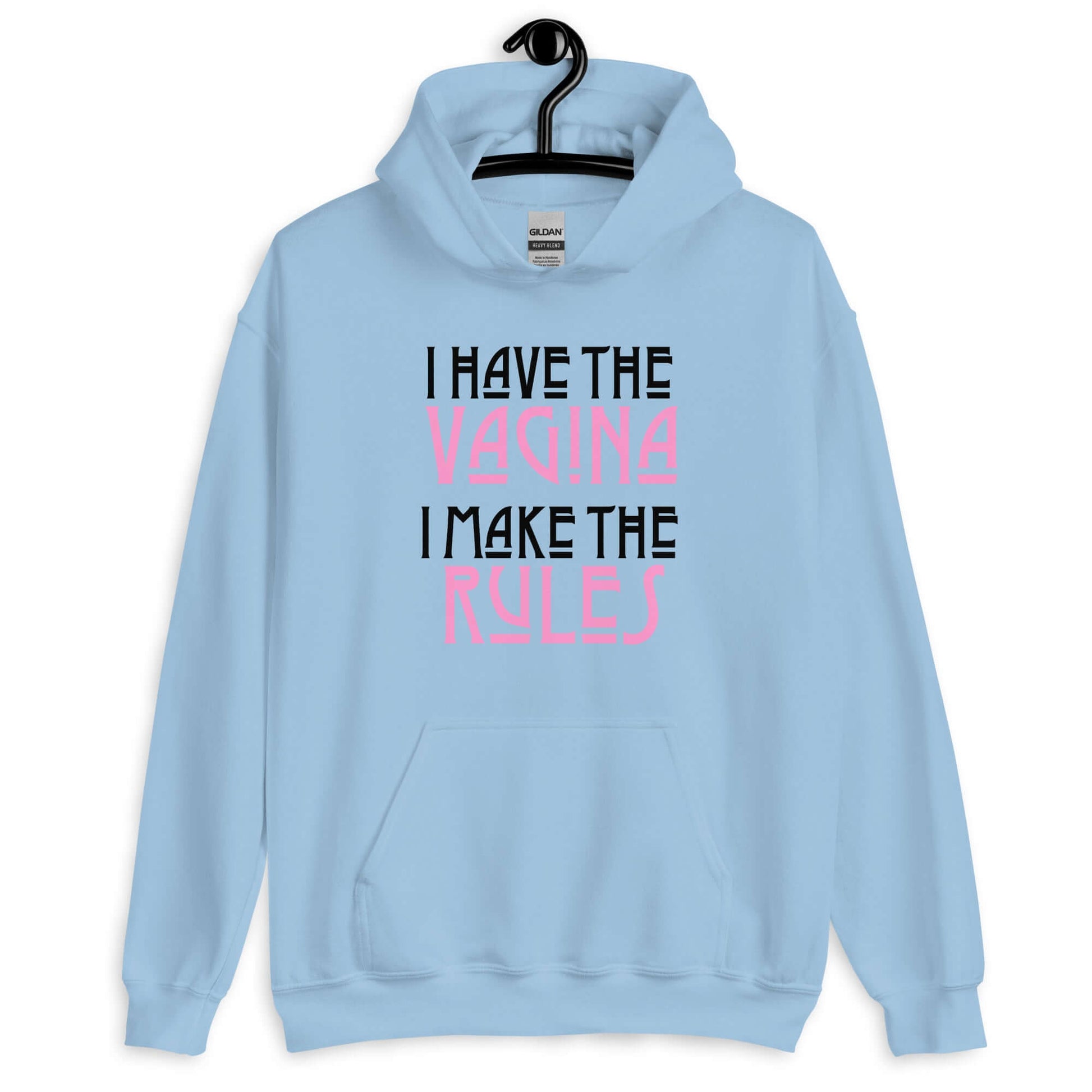 Light blue hoodie sweatshirt with the words I have the vagina , I make the rules printed on the front. The words vagina and rules are pink, the rest of the words are black.