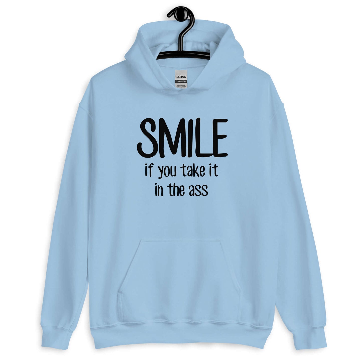 Light blue hoodie sweatshirt with the phrase Smile if you take it in the ass printed on the front. The word smile is large and the words take it in the ass are much smaller.