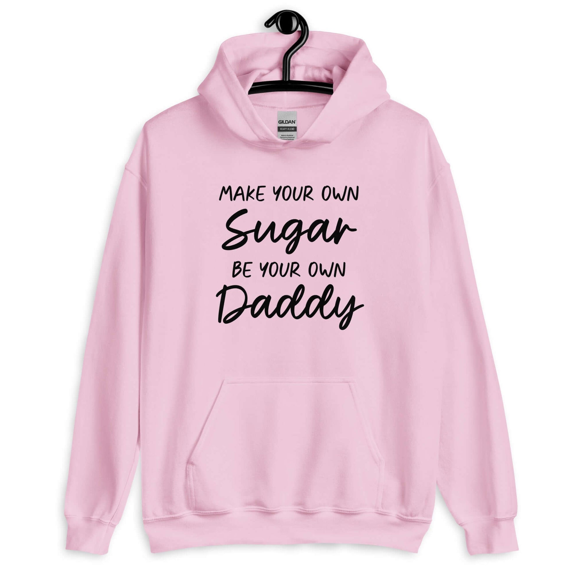 Light pink hoodie sweatshirt with the phrase Make your own sugar Be your own Daddy printed on the front.