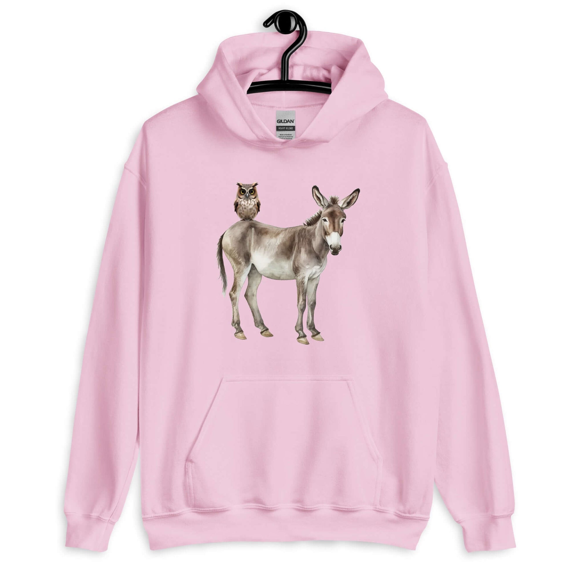 Light pink hoodie sweatshirt with image of a donkey with wise owl sitting on it. The graphic is printed on the front of the hoodie.