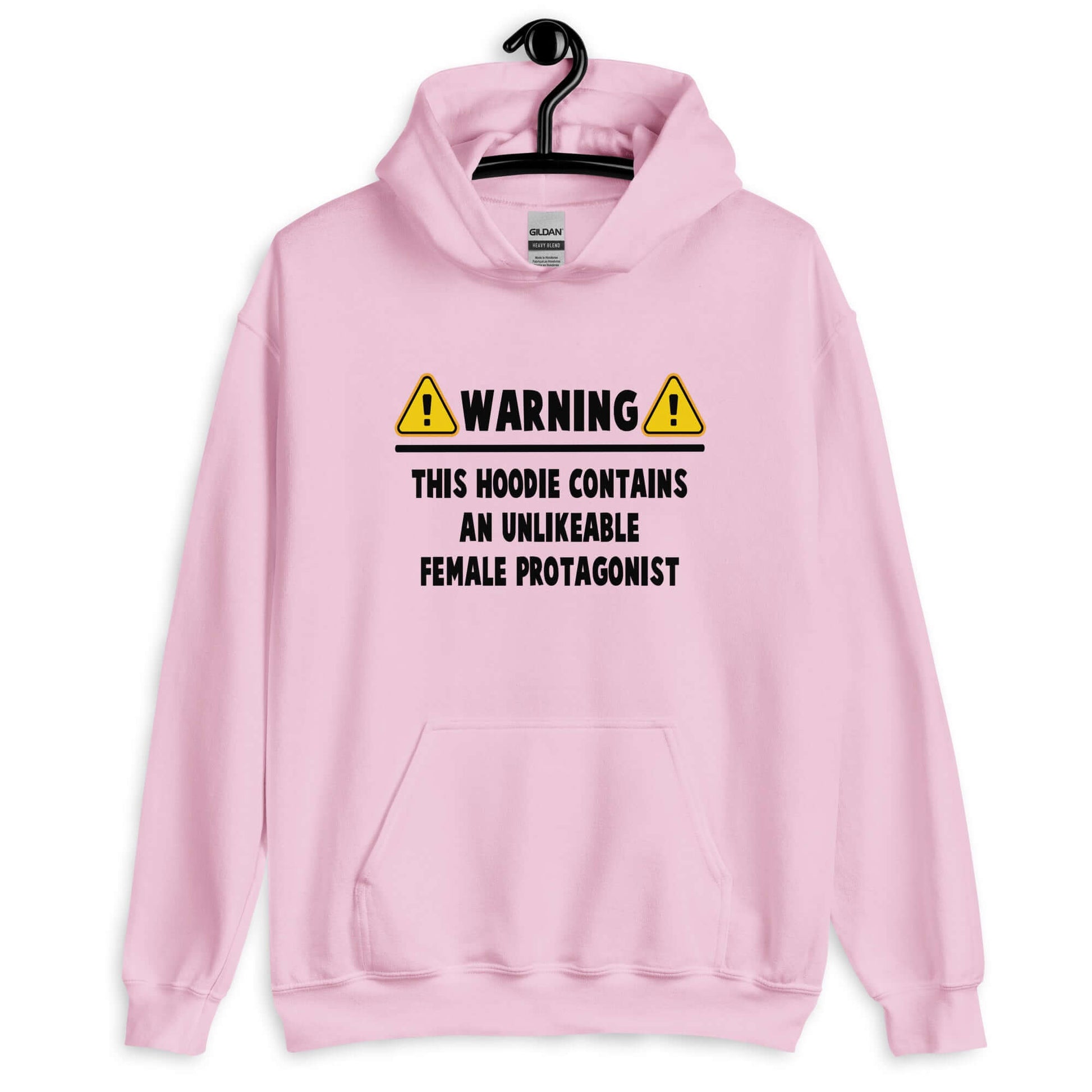 Light pink hoodie sweatshirt with the phrase Warning this hoodie contains an unlikable female protagonist printed on the front.