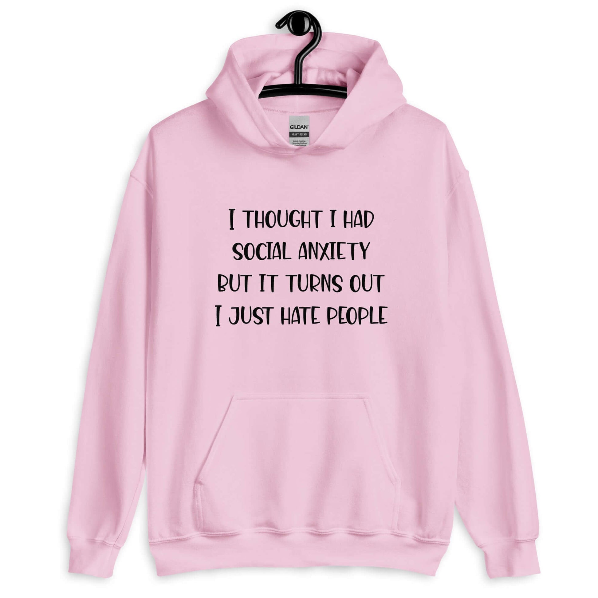 Light pink hoodie sweatshirt with the phrase I thought I had social anxiety but it turns out I just hate people printed on the front.