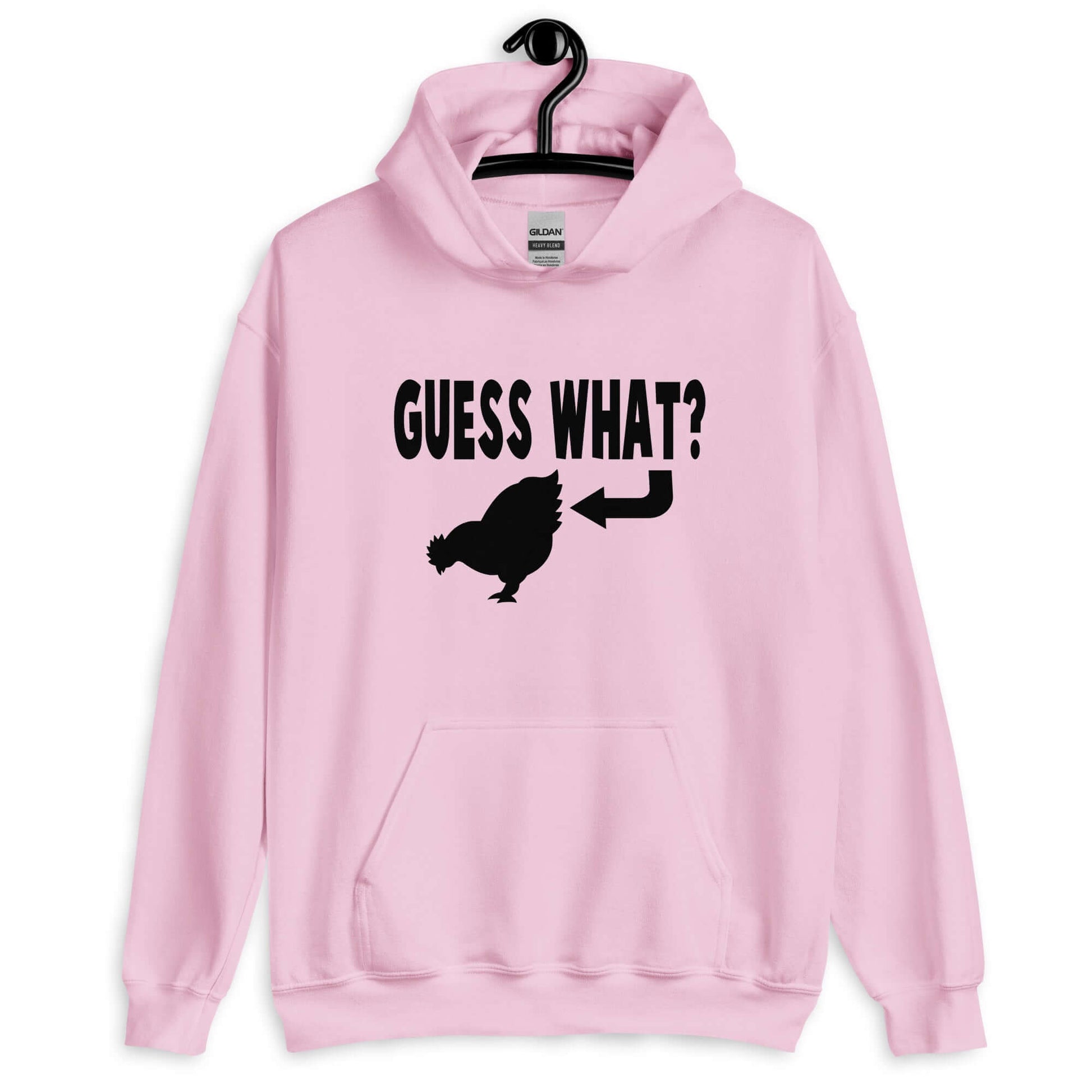 Light pink hoodie sweatshirt with an image of a chicken and the words Guess what question mark. There is an arrow pointing to the chickens butt. The graphics are printed on the front of the hoodie.