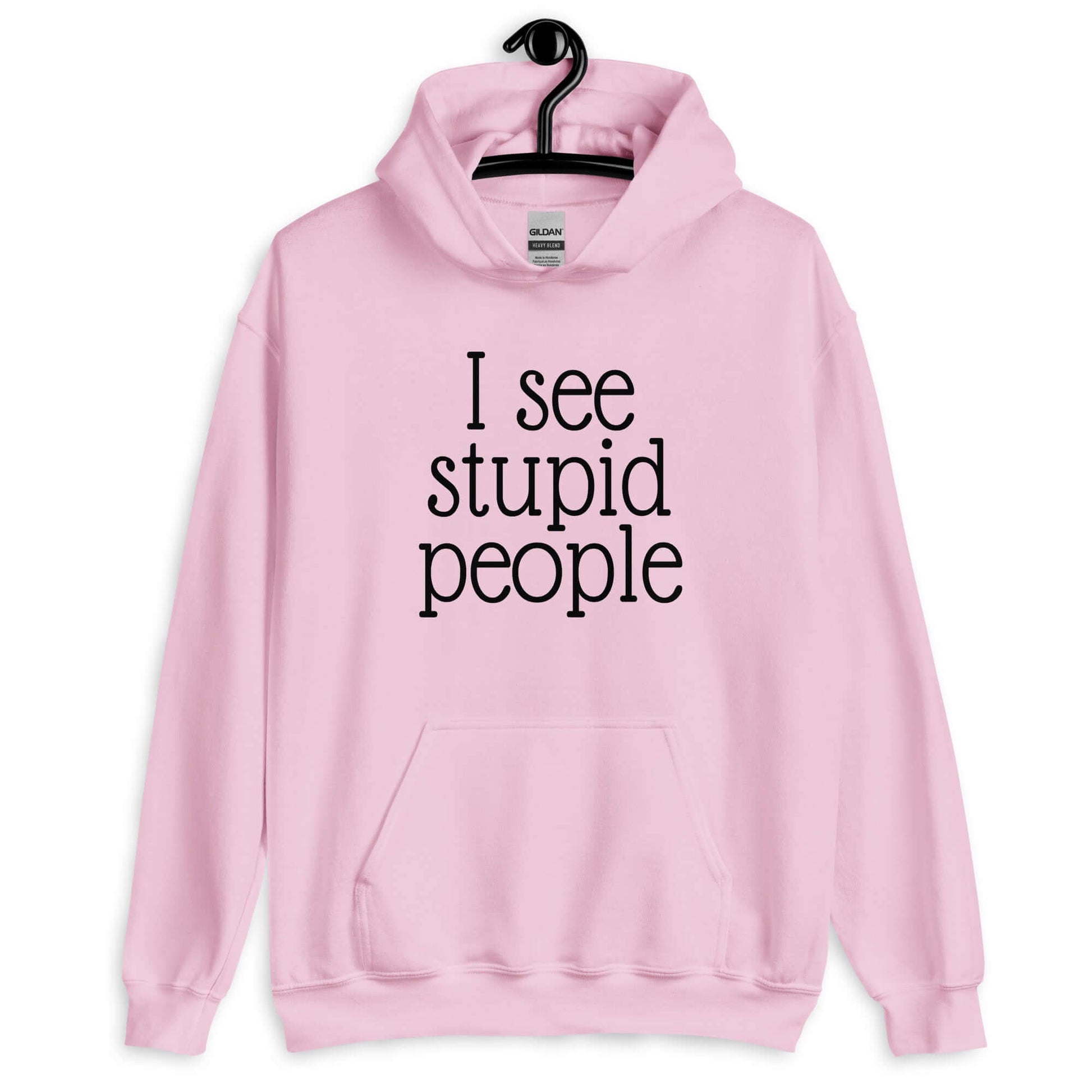 Light pink hoodie sweatshirt that has the phrase I see stupid people printed on the front.