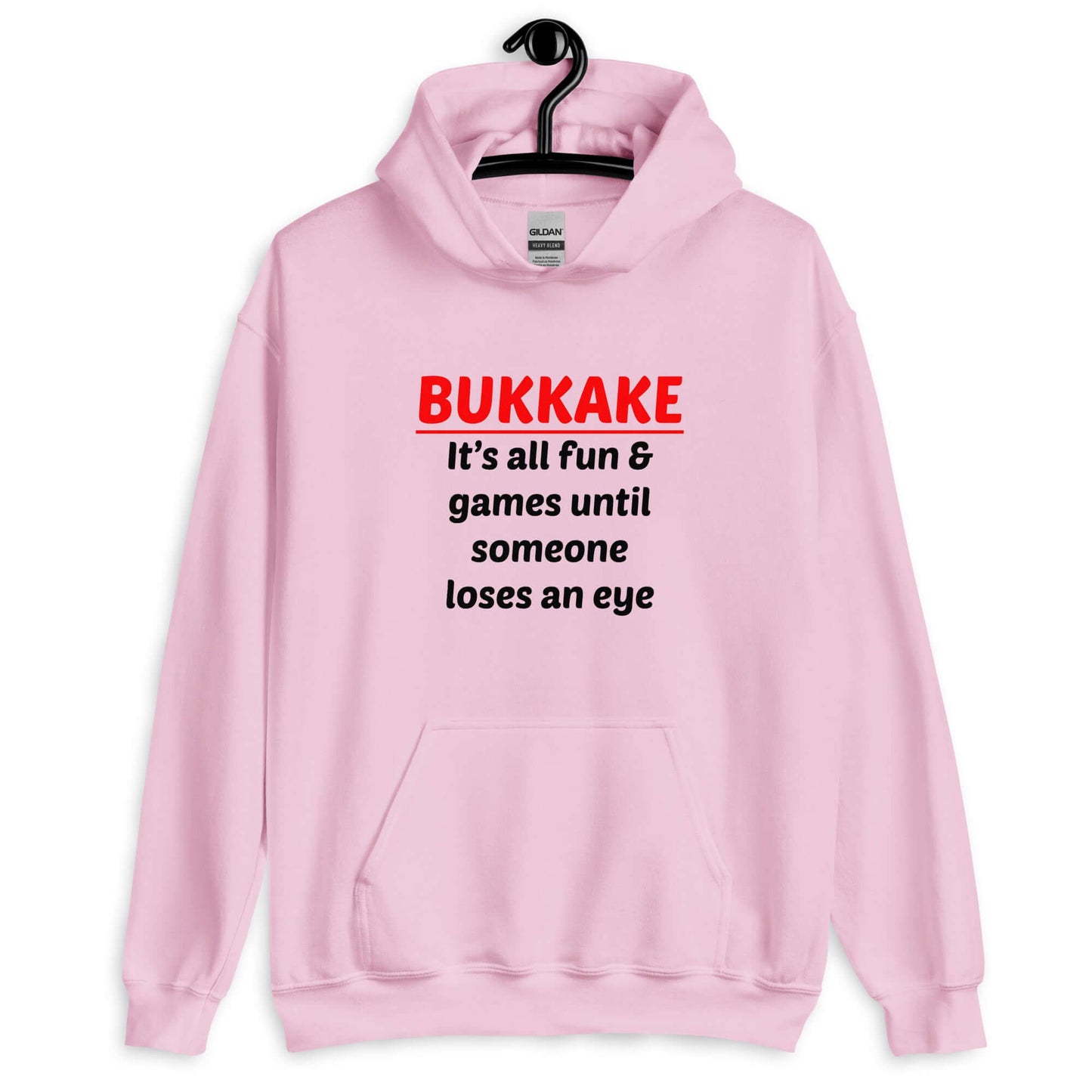 Light pink hoodie sweatshirt with the phrase Bukkake it's all fun & games until someone loses an eye printed on the front.