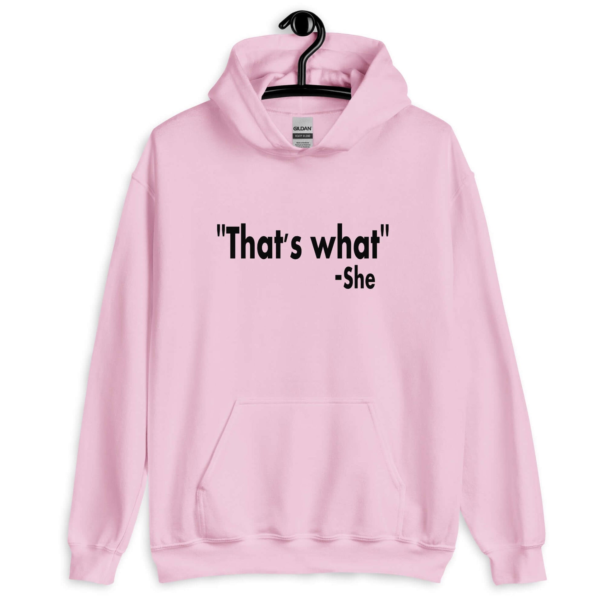 Light pink hoodie sweatshirt with the funny quote That's what-she printed on the front.