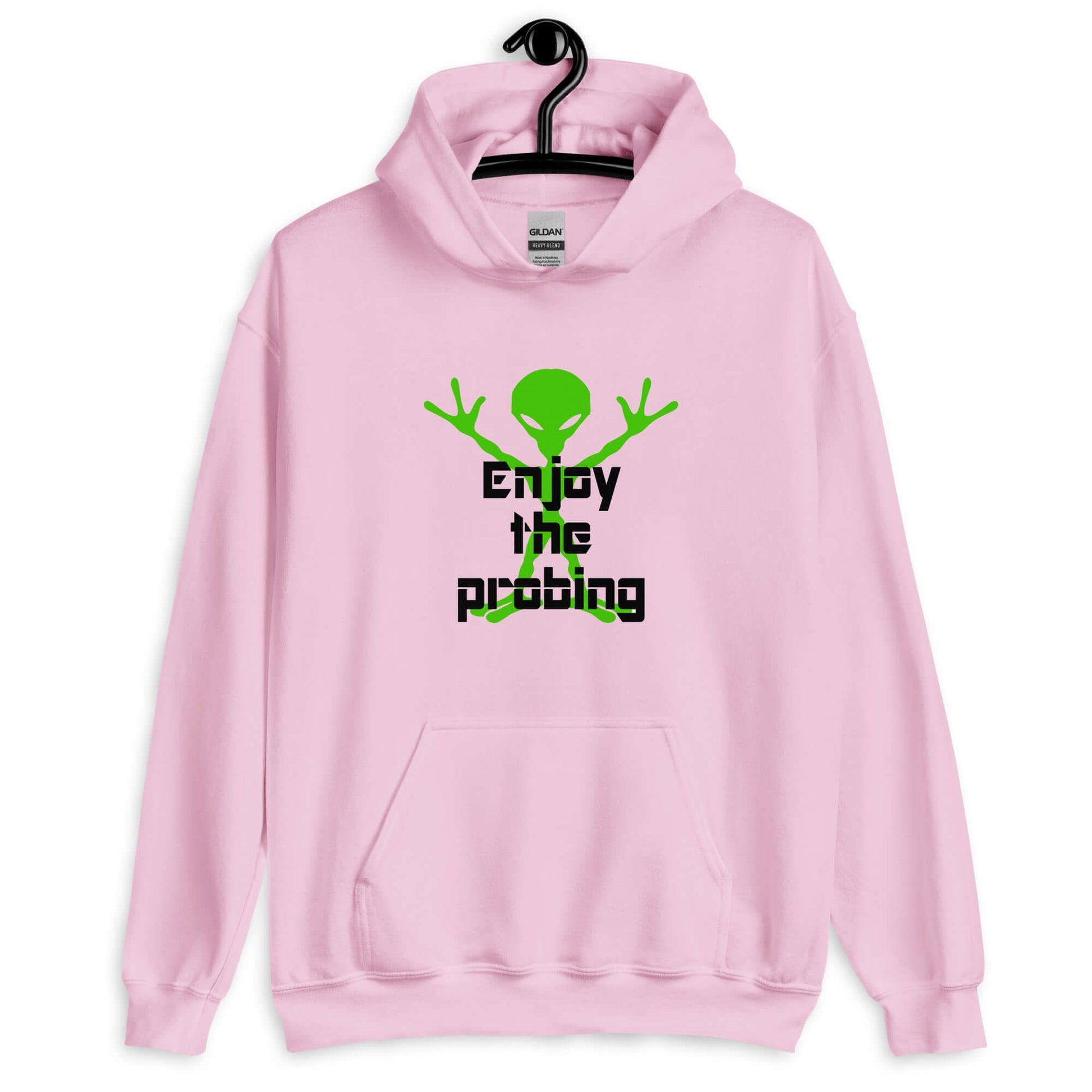 Light pink hoodie sweatshirt with an image of an alien and the funny phrase Enjoy the probing printed on the front.