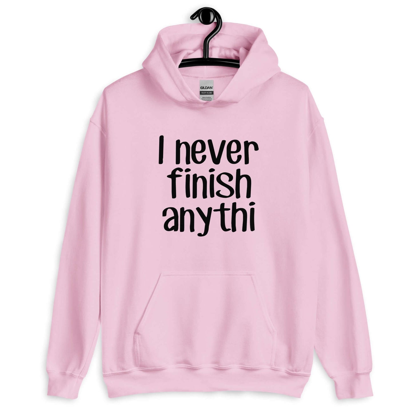 Light pink hoodie sweatshirt with the phrase I never finish anything printed on the front The letters n and g are missing from the word anything.