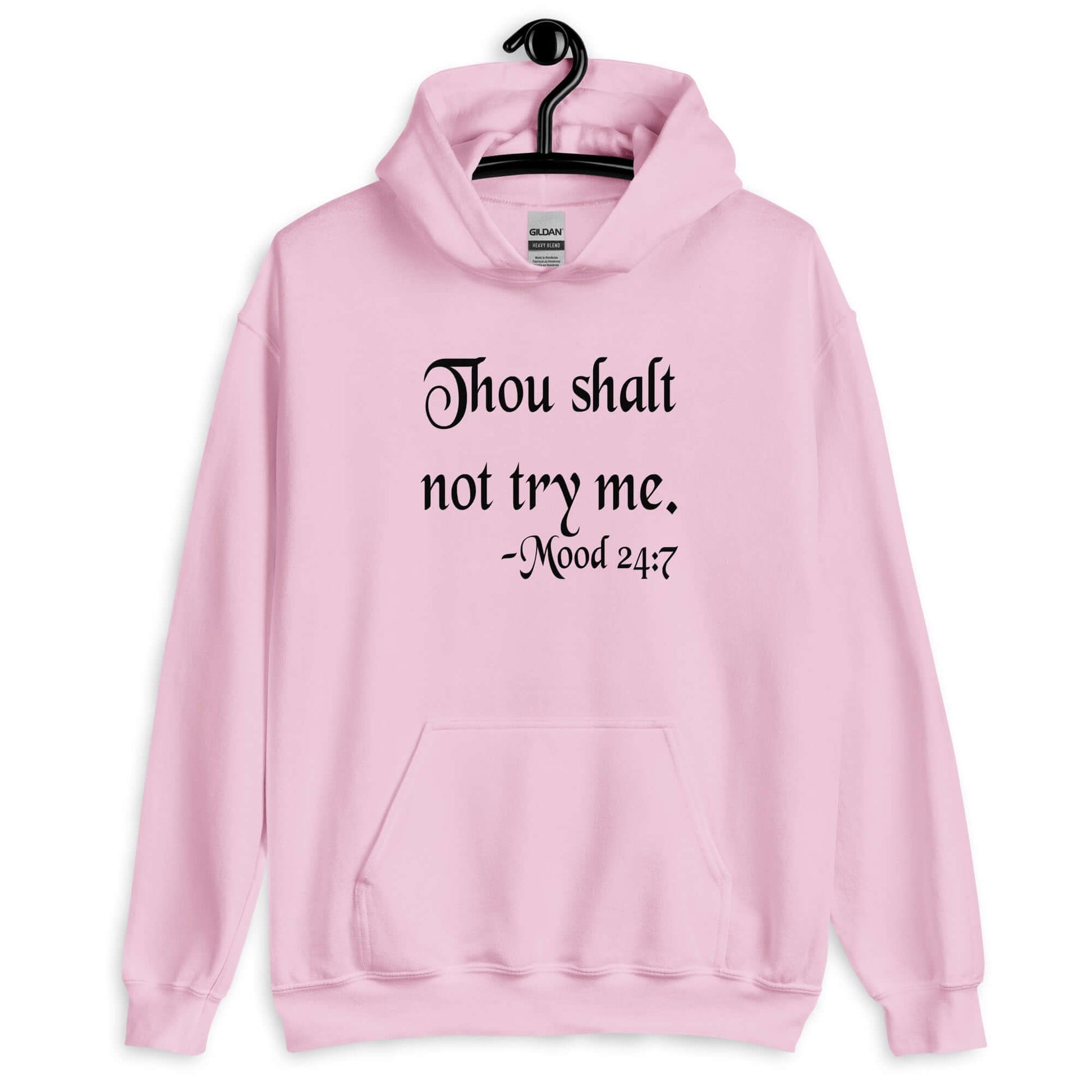 Light pink hoodie sweatshirt with the mock scripture quote Thou shalt not try me Mood 24:7 printed on the front.