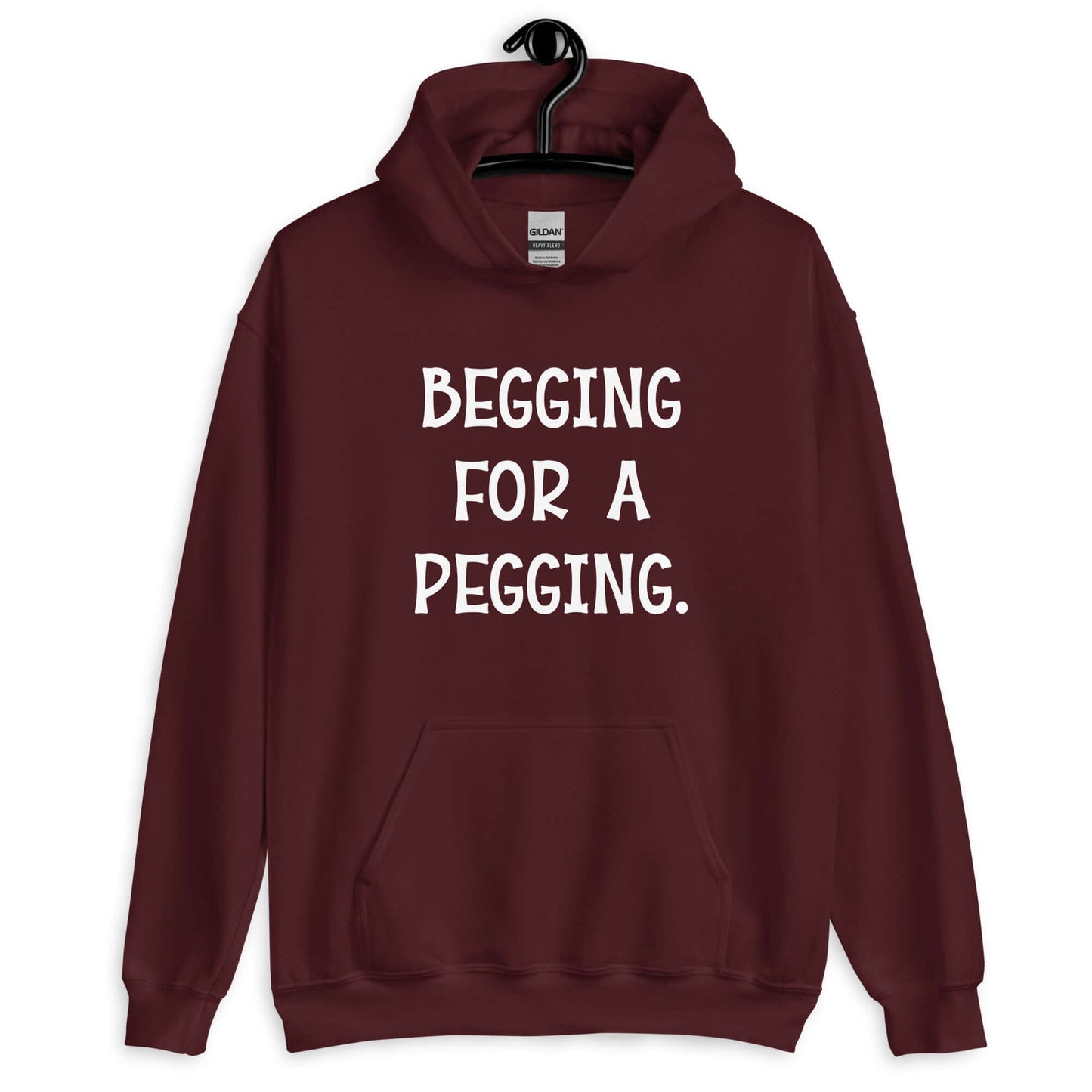 Maroon hoodie sweatshirt with the words Begging for a pegging printed on the front.